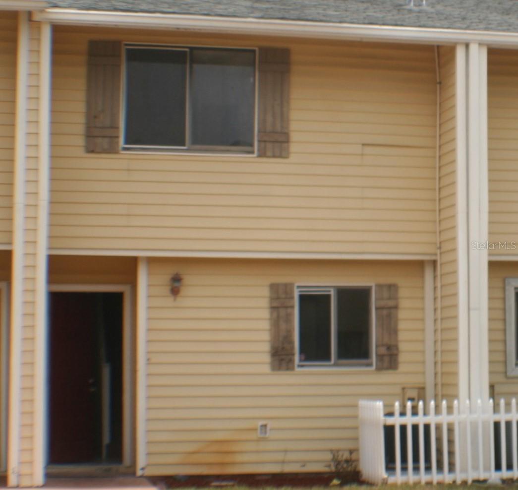 SELLER MOTIVATED!!! Completed removing the Polybutylene pipes!   Move-In-Ready 2 bedroom 1.5 bath condo-townhouse recently remodeled. With new Refridge, and inside washer/drier
(stacked) inside for your convenience. Has a fenced patio - (HOA maintains fence) - upstairs rear deck - all exterior
maintenance is via the HOA. Water is filtered and provided by the HOA; All exterior maintenance via HOA; Trash collection
via conveniently located dumpsters provided by the HOA. Conveniently located near restaurants, shopping, etc.