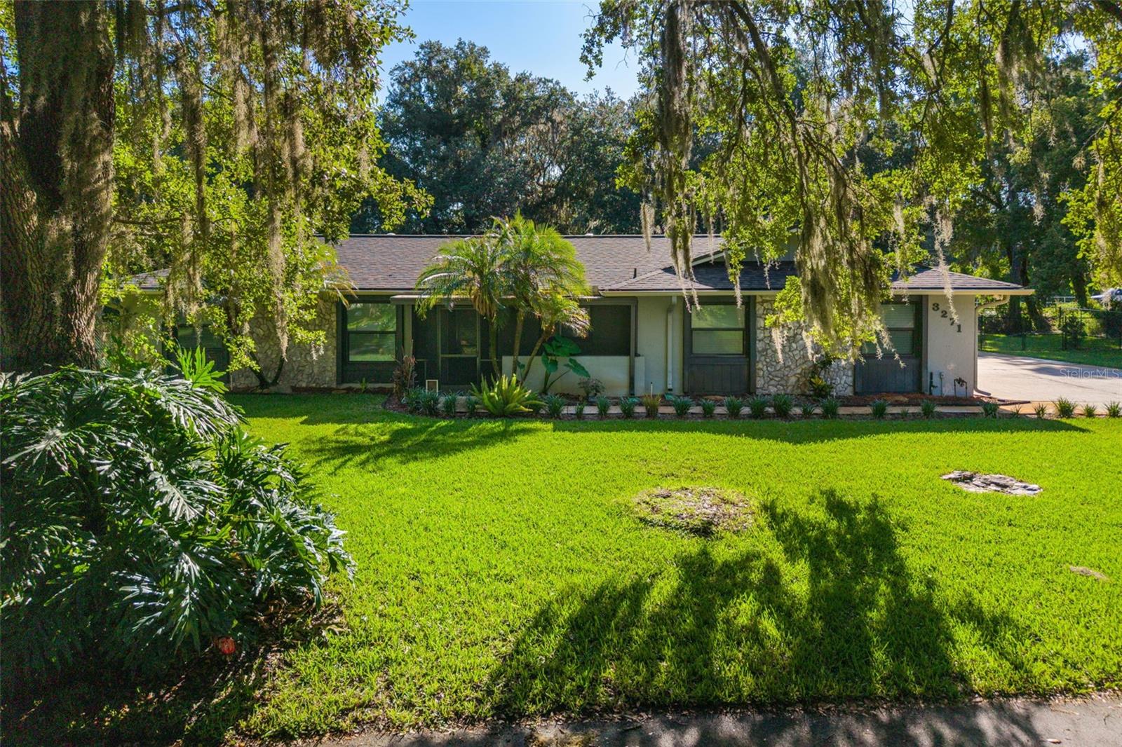 Once you enter Majestic Oak, you'll immediately see where the community gets its name, from the breathtaking canopy of towering mature oak trees that create a truly scenic and welcoming entrance to this fully upgraded 4-bed, 2-bath pool home designed for both luxury living and everyday comfort in one of Saint Cloud's sought-after communities. 

This move-in-ready home comes with its own community neighborhood dock and boat ramp access that leads to a chain of lakes to Lake Tohopekaliga. Features extensive recent upgrades, including a 2024 architectural roof with transferable warranty, full repipe and plumbing updates completed in 2025, impact-resistant Low-E windows, updated drain lines, a whole-house water filtration system, new sod and sprinkler system, fence, and a generous extended driveway offers abundant parking and flexibility for your boats and jet skis!

Inside, the home showcases ceramic flooring throughout the main living areas and bedrooms, custom blinds, designer finishes, and a beautifully renovated kitchen complete with premium Bosch appliances, a custom native trail sink, quartz countertops and backsplash, and a stunning waterfall island. The laundry room also features matching quartz countertops for added style and functionality.

The spacious primary suite offers a true spa-like retreat with a freestanding soaking tub, dual rainfall showers with body jets, double vanities, and a luxury heated bidet with customizable settings. Step outside to your private backyard oasis featuring a saltwater pool with a new 2026 pump and motor, electric pool heater, upgraded screening, new fencing, and plenty of room to entertain and relax year-round.

Additional highlights include: Attic storage with finished walk space, shed, TV mounts, smart alarm system sensors included, septic pump and plumbing already installed for a potential future third bathroom, and thoughtful owner improvements throughout. 

Located just minutes from Lake Nona without the Lake Nona price point, this home offers a close proximity to Boxi Park, shopping, dining, grocery stores, major roadways, Medical City, Nemours Children's Hospital, UCF Hospital, the largest VA hospital, Orlando theme parks and all of Central Florida's top attractions while still enjoying the space, privacy, and value of Saint Cloud living.