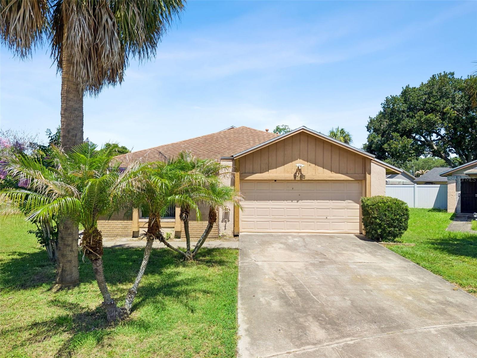 Opportunity knocks in the highly desirable Ginger Mill community! This spacious 2-bedroom, 2-bathroom, 1,319 heated SqFt home offers a functional split floor plan, abundant natural lighting, and ceramic tile flooring throughout, making it the perfect canvas for a homeowner or investor looking to add their personal touch. Priced to sell, this handyman special offers tremendous upside potential with a little TLC and vision. From the moment you arrive, you'll appreciate the home's inviting curb appeal, highlighted by charming, therapeutic palm trees and a private location nestled within a quiet cul-de-sac. The expansive fully fenced backyard provides plenty of room for pets, entertaining, gardening, or future outdoor enhancements. Inside, you'll find a spacious family room and dining room combination featuring a ceiling fan and sliding glass doors that lead to a huge screened-in porch with tile flooring, creating the perfect indoor-outdoor living experience. The kitchen offers ample cabinet storage and comes complete with all major appliances, including a refrigerator, range, and dishwasher. The attached 2-car garage includes washer and dryer connections as well as a ceiling fan for added comfort. The generously sized Primary suite features a Walk-In Closet and a Private En-Suite Bathroom with a freestanding shower equipped with a grab bar for additional accessibility. LOCATION is everything, and this home Delivers!! Conveniently located in South Orlando, residents enjoy immediate access to Publix, Aldi, BJ's Wholesale Club, Costco, Walmart, restaurants, hospitals, major shopping centers, and everyday conveniences. Enjoy being just minutes from popular destinations including The Loop Shopping Center, Orlando International Premium Outlets, major highways and toll roads, Disney World (15 minutes), Universal Studios & CityWalk (20 minutes), Downtown Orlando (20 minutes), and Orlando Int'l Airport (15 minutes). Adding even more value is the incredibly low HOA fee of only $50 per year. Whether you're a first-time buyer looking for a home with potential, an investor seeking your next project, or someone wanting to customize a home to your own taste, this property presents an outstanding opportunity. Bring your vision, roll up your sleeves, and unlock the incredible potential this South Orlando gem has to offer!!