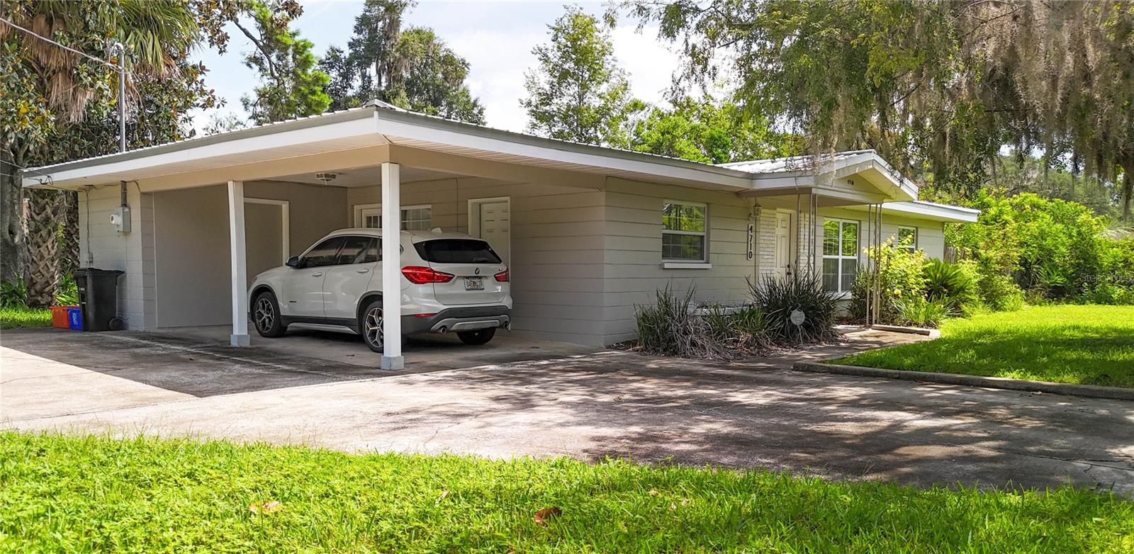 Discover this solid & convenient 4 bedroom 2 bath block home with metal roof; a smart sanctuary comfortably situated in NW Gainesville.  Explore the convenient 3-way split floor plan which offers functionality and options;  Enjoy natural light with the open floor plan, a modern kitchen and appliances; bonus room offering space for work or play, gym, office; large screened back porch, privacy fenced yard, Additional highlights include an enclosed laundry room, carport, spacious bedrooms, and storage shed.

Conveniently located near top-rated schools, shopping, dining, Santa Fe College, North Florida HCA, UF, Shands and VA, this home is ready for you to enjoy Florida living at its best!

Updates include stainless appliances, 2026 water heater, 2019 metal roof, 2018 HVAC, 2017 irrigation pump
