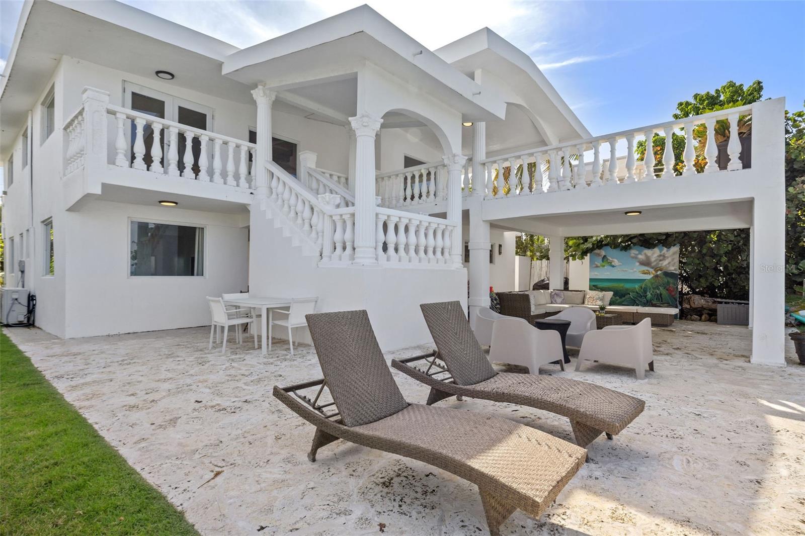 Turn your dreams into reality with this incredible investment opportunity! The Casablanca House is a breathtaking 6-bedroom, 5-bathroom oceanfront property located in the highly sought-after area of Las Picuas, Río Grande. Already generating significant revenue through short-term rentals, this fully furnished and equipped home is the perfect turnkey investment. Enjoy direct ocean views from multiple balconies, a large swimming pool, and expansive outdoor spaces that include an outdoor shower and a grill—ideal for entertaining. Inside, you'll find spacious living areas with multiple dining areas, a full kitchen, and ample room for family and guests. The property is conveniently located just 35 minutes from San Juan Airport, and is close to popular attractions like El Yunque Rainforest and Carabali Adventure Park. This is a rare opportunity to own a piece of paradise that is already making thousands in monthly revenue on short-term rental platforms. Don't miss out on this profitable investment..
