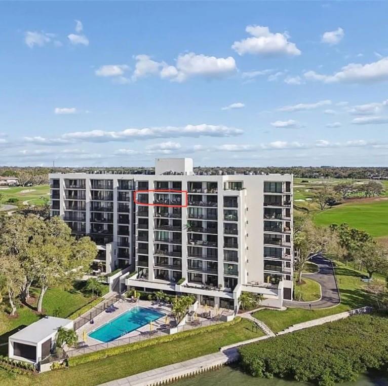 Price Reduction!  Enjoy this beautiful 7th floor condominium located inside the gates of the Belleair Country Club which includes TWO 18 Hole Championship Golf Courses!!  Owning this unit allows you to BYPASS the 5 year long wait list and receive 25 percent off the exclusive club initiation fee.  This stunning 2-bedroom, 2-bath condo offers mesmerizing panoramic views of Belleview Island, the Sand Key Bridge, and the Intracoastal Waterway from a Private Balcony. The bright, open floor plan defines Florida living, featuring abundant natural light, walls of hurricane-rated sliders, and seamless indoor-outdoor living. The beautifully Remodeled Kitchen (2025) flows effortlessly into the dining and family rooms making it ideal for entertaining. A versatile guest bedroom opens to the living area for added Entertaining or Office Space with plantation shutter dividers available when privacy is desired. The spacious primary suite offers double closets and an en-suite bath with quartz countertops and a tub/shower combination. For added convenience, a hall laundry closet includes a washer and dryer for ease of use. A BRAND NEW HVAC System installed March 2026!  Residents enjoy a dog-friendly community with a heated pool, newly remodeled clubhouse, New Hurricane Windows in the Common Hall Areas (2026), a New Sprinkler System inside the entrance of each home (2026), New Bike Storage, manicured grounds, and close proximity to boutique shopping, local dining, attractions, and the sugar-sand beaches of the Gulf Coast. Private Club Members have access to two championship Donald Ross-designed Golf Courses, tennis and pickleball, a resort-style pool, spa services, a state-of-the-art fitness center, marina with boat slips available for rent (subject to availability) and fine dining. This high-and-dry community does NOT require Flood Insurance.  Don’t miss this exceptional opportunity to experience luxury living in one of Belleair’s most sought-after communities.