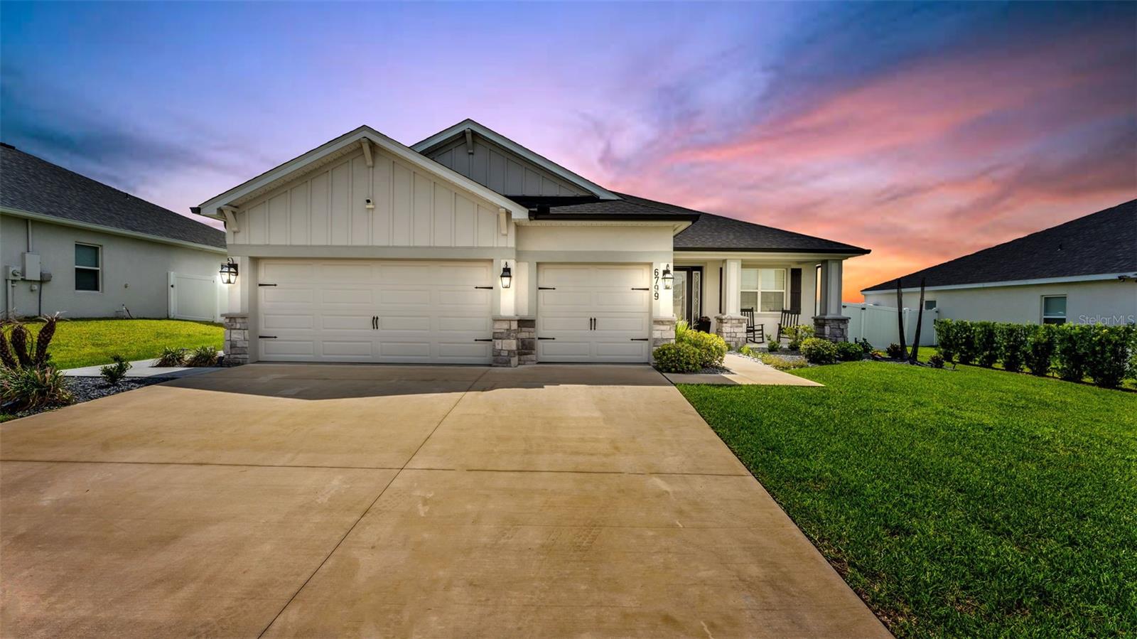Better than new. Thoughtfully upgraded. Completely move-in ready!!

Why wait months for new construction when this stunning 2023-built home already has the upgrades, style, and functionality today's buyers are looking for? Located in one of South Lakeland's most desirable gated communities, this exceptional residence offers the perfect balance of modern design, everyday comfort, and timeless finishes.

The thoughtfully designed floor plan features four bedrooms, three full bathrooms, a private office, and a spacious three-car garage. Whether you're working remotely, running a business, homeschooling, or simply need a quiet place to focus, the dedicated office provides the flexibility every homeowner can appreciate.

Step inside to a bright, open-concept living space where luxury vinyl plank flooring flows seamlessly throughout. The living room is highlighted by a custom electric fireplace that serves as a beautiful focal point, while a matching fireplace in the primary suite creates a peaceful retreat at the end of the day.

Designed to bring people together, the kitchen is both functional and impressive. An oversized island with custom stone detailing, granite countertops, stainless steel appliances, designer pendant lighting, and generous workspace make it equally suited for entertaining guests or everyday family life.

The split-bedroom layout offers privacy for everyone. Two secondary bedrooms share a Jack-and-Jill bathroom, while a separate guest suite is tucked away beside the third full bath, which also provides direct access to the covered lanai..... already perfectly positioned for your future pool.

The spacious primary suite feels like a private retreat, complete with dual vanities, a freestanding soaking tub, a walk-in shower, and an impressive custom-designed walk-in closet.

No detail has been overlooked. Additional upgrades include a convenient laundry room with a built-in drop zone, an automated sliding door shade, epoxy-coated garage floors, overhead storage racks, and a fully integrated Vivint Smart Home Security System featuring a smart front door lock, video doorbell, smart thermostat, eight security cameras, window and door sensors, glass-break detection, and smoke/fire monitoring..... providing exceptional convenience and peace of mind.

Outside, the covered lanai overlooks a fully fenced backyard with beautifully maintained landscaping, offering the perfect place to enjoy quiet mornings, entertain friends, or unwind after a long day.

With nearly every upgrade already completed, this home allows you to skip the added expense and uncertainty that often come with new construction. Simply move in and start enjoying everything it has to offer.

This isn't just another new home..... it's one that's already been elevated beyond builder grade. Schedule your private showing today and experience why this South Lakeland gem truly stands apart,