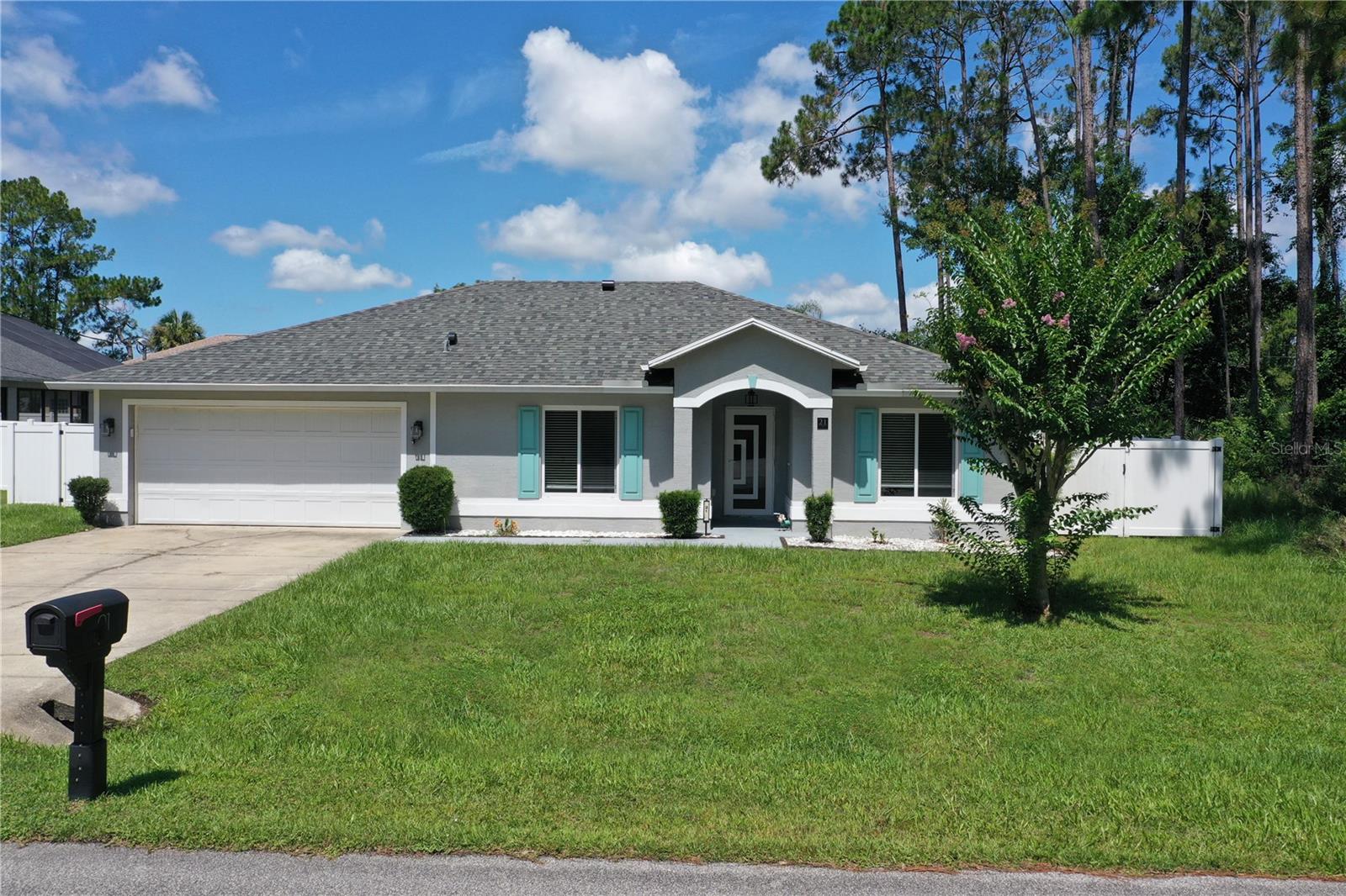 Welcome to this well-maintained 3 bedroom, 2 bath residence offering the perfect combination of comfort and value. Situated on a generous 80' x 125' homesite, this property features a fully fenced backyard, providing plenty of space for pets, gardening, or creating your own private outdoor retreat.  Inside, you'll find a split bedroom floor plan with comfortable living spaces and a 2-car garage offering ample storage and convenience. Two of the home's standout features is the newer roof and impact windows and doors, providing added peace of mind and reducing future maintenance concerns. Whether you're a first-time homebuyer or searching for an investment opportunity, this home offers exceptional potential. Conveniently located near I95, you'll enjoy easy access to shopping, restaurants, parks, schools, walking and biking trails, medical facilities, and just a short drive to the area's beautiful Atlantic beaches.