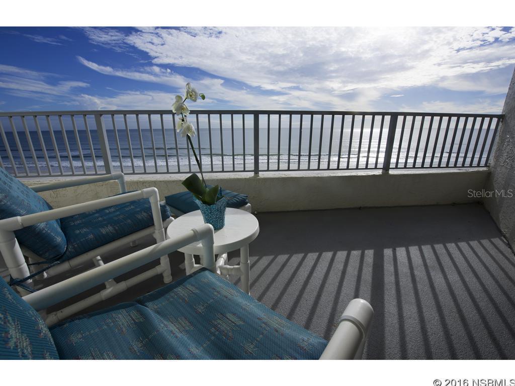 Captivating panoramic views of the ocean and sunrise from this direct oceanfront 2/2 condo, located on the no drive beach.   Listen to the surf from either of the 2 private balconies or from the living area and Master bedroom. This immaculate and well maintained gated entry condo is beautifully decorated.  Living area offers an electric fireplace to add ambiance on a chilly day.  Kitchen features pull out pantry with plenty of cabinet storage and breakfast bar.  Dining area features built in china cabinet and built in wine racks.  View the ocean from your master bedroom with a private balcony and walk in closet.  Master Bathroom has upgraded cabinetry and fixtures, double shower heads and a wonderfully large 2 person whirpool spa Jacuzzi tub.  Master bedroom/bath and 2nd bedroom/bath are not close to each other offering privacy to your guests. Washer/Dryer is located in hall cupboard. Excellent rental history and onsite rental management available for Investors.  Association offers secure underground parking, heated pool and spa (with protection from the wind), 2 Saunas, Oceanside and indoor Suffleboard, Lighted tennis courts,  BBQ area, 2 elevators, A/C is located in the covered garage out of the elements. Stairs and Wheelchair access to the beach. ;LocationDescription: Condo ;Water: City