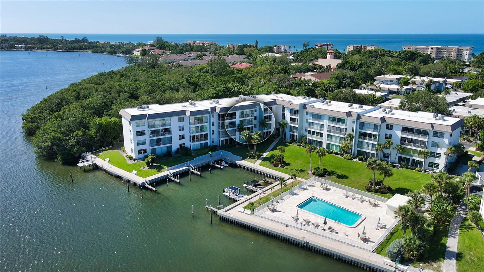 Enjoy the best of the Longboat Key lifestyle in this beautifully updated 2-bedroom, 2-bath waterfront condo at Sutton Place, offering a rare Gulf-to-Bay experience with Sarasota Bay views and PRIVATE DEEDED BEACH ACCESS to a Gulf-front beach just across the street. This light and bright residence features a spacious, open floor plan with quality finishes throughout, including porcelain tile and engineered hardwood flooring for a clean, modern, low-maintenance feel.

The updated kitchen is both stylish and functional, showcasing quartz countertops, a mother-of-pearl mosaic backsplash, tray ceiling, and stainless steel appliances. The primary suite includes a fully remodeled bathroom with quartz counters, custom glass shower, and marble tile, while the guest bathroom features granite countertops and a vessel sink. A glass-enclosed and screened lanai extends the living space, bringing in natural light and allowing you to enjoy peaceful bay breezes year-round. Recent upgrades include newly installed IMPACT RESISTANT WINDOWS & DOORS, providing added safety, energy efficiency, and peace of mind. Updated lighting was also added in the living area

This residence is being sold TURNKEY FURNISHED, making it truly move-in ready or ideal as a second home or investment property. As an added bonus, the sale includes four brand new KAYAKS—perfect for enjoying the community’s direct bay access and embracing the waterfront lifestyle.

Sutton Place is a highly desirable waterfront community offering exceptional amenities, including deeded Gulf beach access with pavilion, gated parking, showers, and picnic areas, TWO heated bayside POOLS, BBQ grills, BOAT SLIPS (first-come, $300/year), kayak storage and launch, fishing dock, clubhouse, and covered parking with ample guest spaces. The community is pet-friendly (2 pets up to 25 lbs each), not age restricted, and allows two rentals per year with a one-month minimum after the first year of ownership, making it ideal for both personal use and investment.

Recent community improvements include new roofs, exterior repainting, and resealing (2023), along with a completed milestone inspection. Ideally located mid-key, close to Bayfront Park, dining, shopping, and just a short drive to Anna Maria Island, St. Armands Circle, and downtown Sarasota. Don’t miss this opportunity to own a piece of paradise on Longboat Key.