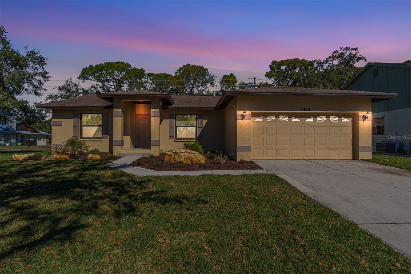 2105 Cork Oak St is a 3 bedroom 2 bath home located in Colonial Oaks subdivision.  This concrete block home has a split floor plan with the main bedroom and 2 guest rooms as well as an open concept with the living room being the center of the home with views of the kitchen, dining room and screened in patio.  Other features include a 2 car garage, corner lot, irrigation system, impact sliding glass doors and more.  The neighborhood is near I-75, shops and restaurants and also features tennis and basketball courts, a community gymnasium, shaded picnic tables with BBQ grills, walking trails and a fenced-in play area for the kids.