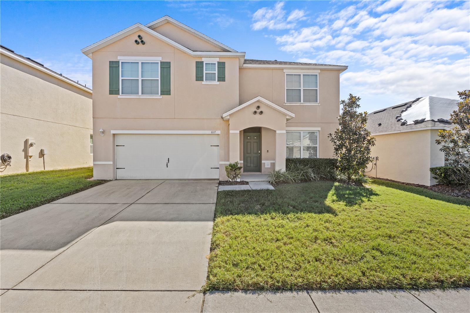 Virtually Staged. Welcome to this beautiful 5-bedroom, 3-bathroom two-story home located in the sought-after gated community of Calabay Parc at Tower Lake in Haines City. Offering a spacious and versatile floorplan, this home is perfect for growing families, multi-generational living, or those who simply need extra space. As you enter, you'll find a dedicated den/home office to the right, providing the ideal space for remote work, studying, or a quiet retreat. Continue into the heart of the home where the open-concept kitchen features a center island and overlooks the dining and living areas, creating a seamless space for entertaining and everyday living. The first floor includes a guest bedroom and full bathroom, offering convenience and privacy for visitors or family members. Upstairs, a large loft area serves as a flexible bonus space and is surrounded by four additional bedrooms. The spacious primary suite features a well-appointed en-suite bathroom with dual sinks, a walk-in shower, and ample storage. Located in a quiet neighborhood with easy access to shopping, dining, major highways, and Central Florida attractions, this home offers the perfect combination of comfort, functionality, and location. Don't miss your opportunity to make this spacious Haines City home your own!