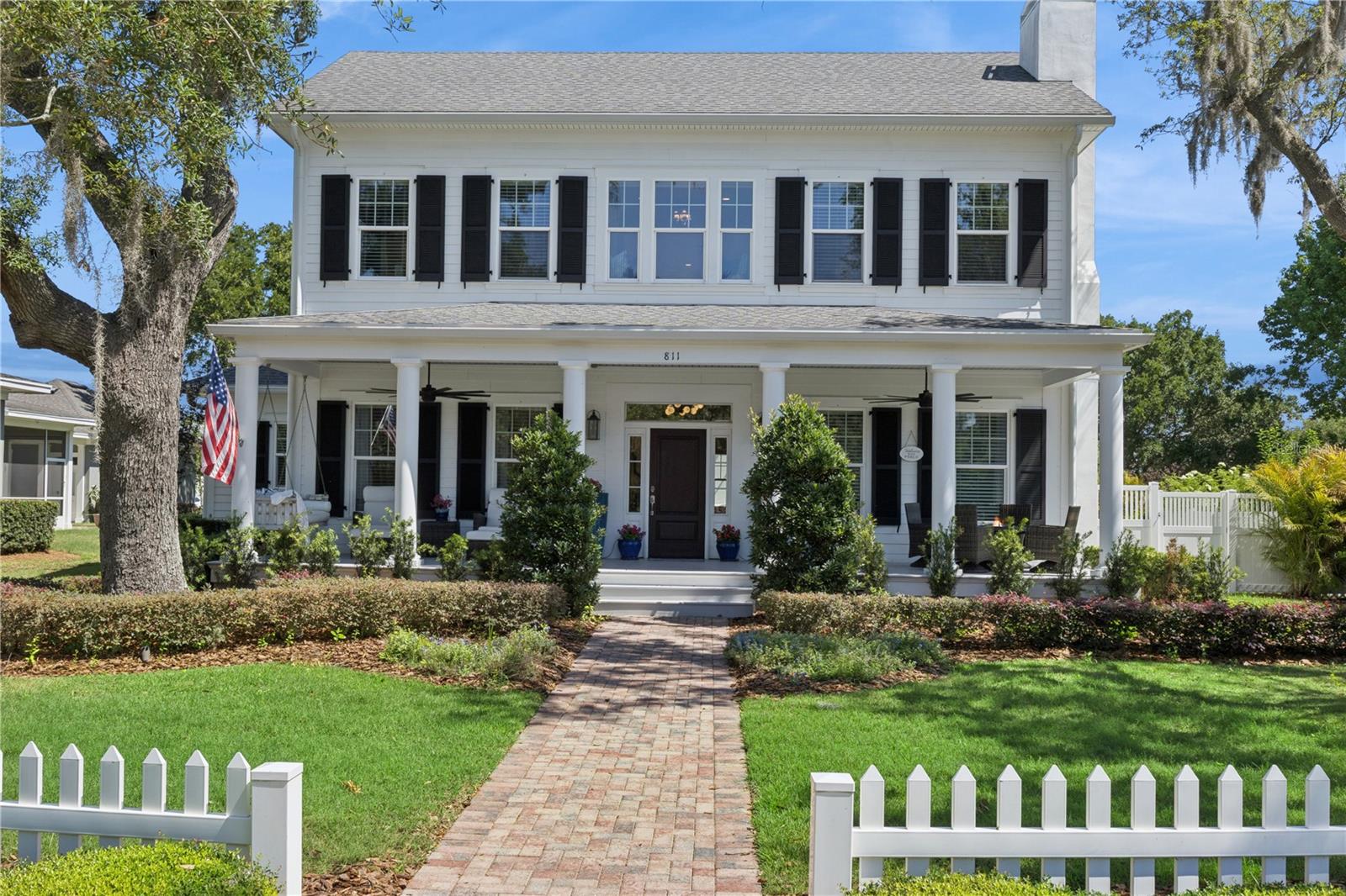 Experience elevated living in this exceptional custom home by J&J Building, perfectly positioned in one of Winter Garden’s most desirable locations directly across from the iconic West Orange Trail. Offering over 5,000 square feet of thoughtfully designed luxury, 811 Civitas Way blends sophisticated style, flexible living spaces, and impressive functionality rarely found in today’s market.
Designed for both everyday comfort and unforgettable entertaining, the home features a truly jaw-dropping media room that delivers the ultimate cinematic experience. Multiple office and flex space options provide incredible versatility for remote work, creative pursuits, fitness, or multigenerational living. With bedrooms thoughtfully positioned on both the first and second floors, the layout offers ideal privacy and convenience for guests and family alike.
Luxury details and custom upgrades are showcased throughout, including a whole-home generator, a one-year-old Sub-Zero refrigerator, two stunning crystal chandeliers installed last year, and elegant solid brass door hardware throughout the home. You'll fall in love with the large island in the garage that even includes a built-in gift wrapping station! Every space reflects exceptional craftsmanship and thoughtful design, with countless additional custom touches that elevate the home’s overall sophistication and character. 
One of the property’s standout features is its exceptionally rare amount of parking for 7 cars plus a golf cart— a coveted luxury that sets this home apart. Combined with its prime location near Downtown Winter Garden, scenic trail access, dining, shopping, and commuter routes, this residence offers a lifestyle that is as refined as it is practical.
**There is room to add a pool and ADU on this lot, as well! Artist renderings with the pool included in the photos.