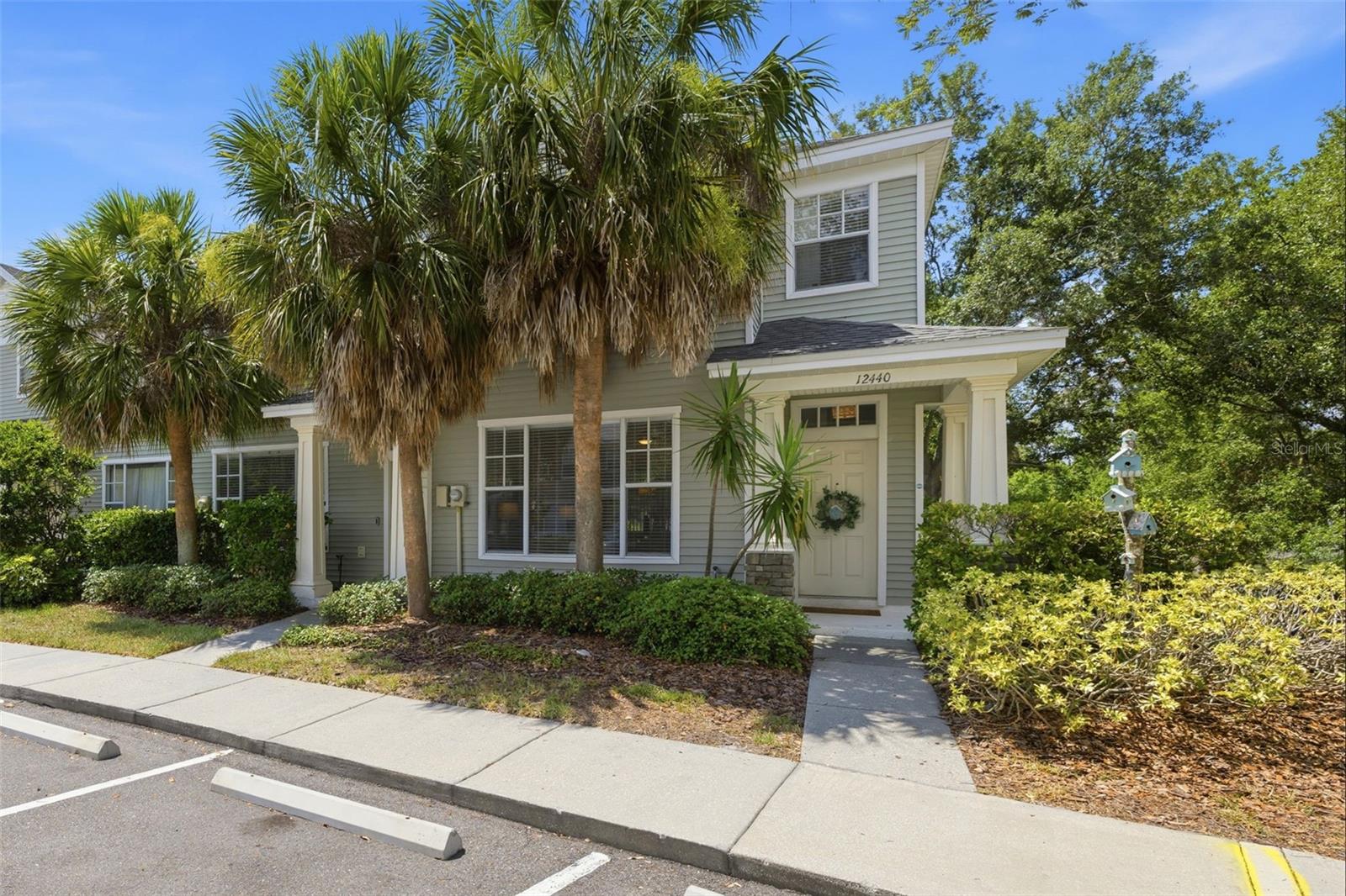 Welcome home to this beautifully updated 2-bedroom, 1.5-bath end-unit townhome nestled in the highly desirable Country Chase community. Offering the perfect blend of comfort, convenience, and low-maintenance living, this home is ideal for first-time buyers, downsizers, or anyone seeking a prime Tampa location.

Step inside to find a bright and inviting open-concept living and dining area featuring updated flooring and peaceful views of the private lanai and wooded backyard. The kitchen is equipped with newer appliances, a breakfast bar, and even a wine refrigerator—perfect for entertaining or enjoying a quiet evening at home.

Upstairs, you'll find brand-new carpet throughout, including in the spacious primary suite, which features a walk-in closet and an updated en-suite bath with decorative tile accents. The generously sized secondary bedroom also offers fresh new carpeting and plenty of natural light. A convenient upstairs laundry closet includes a brand-new washer and dryer (2025) for added ease.

Major updates provide peace of mind, including a new A/C system (2020), updated lighting fixtures, newer appliances, and fresh carpeting throughout the second floor.

Residents of Country Chase enjoy an exceptional lifestyle with low HOA fees and access to community amenities including a swimming pool, basketball court, playground, and scenic dog-walking paths reserved exclusively for residents.

Ideally located near Citrus Park, Tampa International Airport, Westshore Business District, the Veterans Expressway, I-275, top-rated shopping, dining, entertainment, and the beautiful Gulf Coast beaches, this move-in-ready end unit offers the best of Tampa Bay living.

Don't miss this opportunity to own one of the community's desirable corner units!