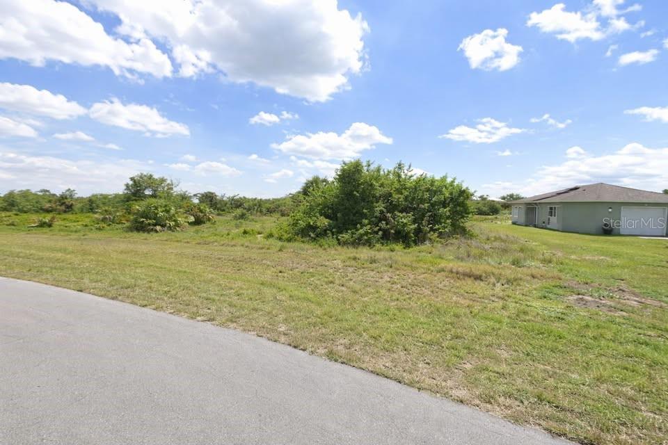 Explore the potential of this residential lot located in the growing Banyan Village community of LaBelle. Surrounded by natural Florida landscape and steady development, this parcel offers a quiet setting with convenient access to local amenities, schools, and future infrastructure improvements. A solid opportunity for buyers looking to build or hold land in an expanding area. Buyer to verify all building requirements, utilities, and county guidelines.