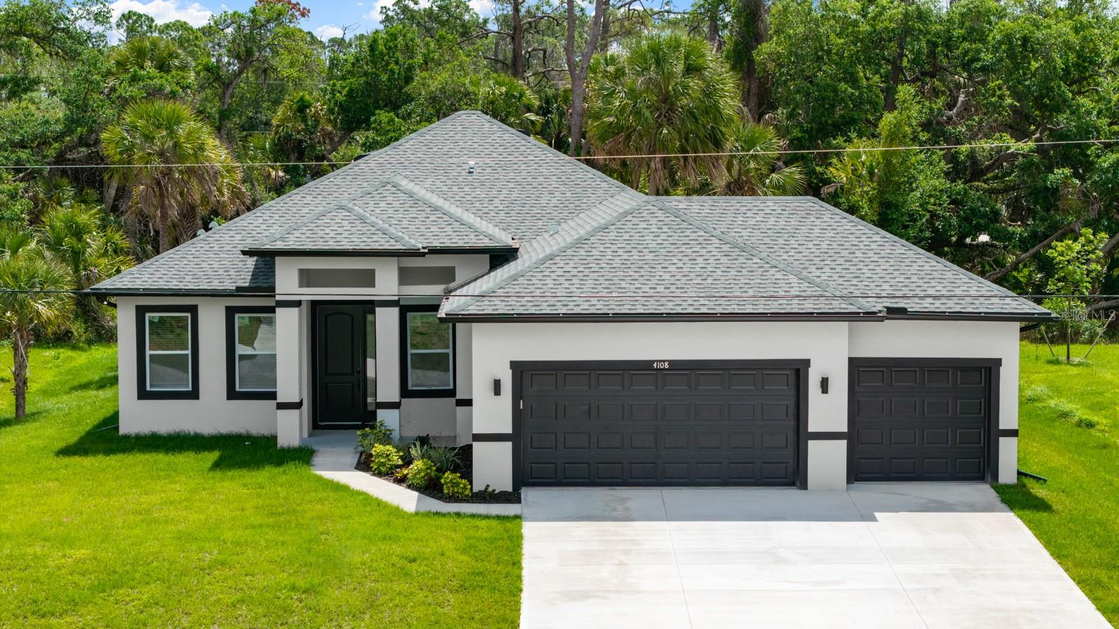 Back on the market, this home is a showstopper! Motivated Builder. No FLOOD, No HOA, and No CDD fees. Enjoy $3,799 toward closing costs and a complimentary appraisal with our preferred lending partner. Welcome to this stunning brand-new home offering 1,839 sq. ft. of elegant living space, thoughtfully designed for modern comfort and style. This residence features 3 spacious bedrooms plus a versatile flex room or den, perfect as a fourth bedroom, home office, or creative space. The open-concept layout connects the kitchen, dining, and living areas seamlessly, ideal for entertaining or relaxing. Enjoy high-end finishes, a beautiful fireplace, a modern kitchen with a central island and new stainless-steel appliances, high ceilings, and a three-car garage. With a total area of 2,866 sq. ft., including a covered lanai, this home perfectly balances functionality and sophistication. Additional highlights include a SMART KEY system and a 2-10 Home Buyers Warranty for peace of mind. Schedule your showing today!