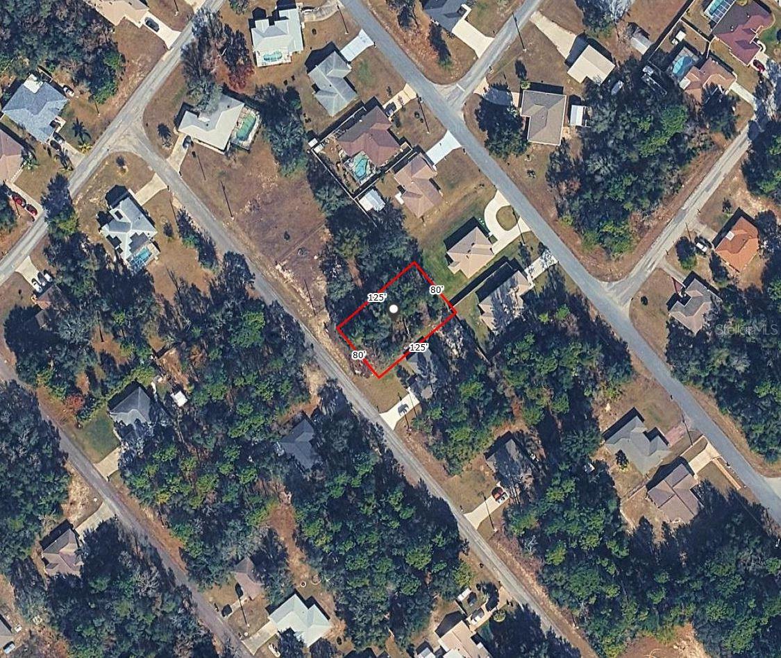 CITY WATER LOT 0.23-acre homesite in desirable Citrus Springs featuring paved road access, city water available, electricity nearby, and surrounded by beautiful new construction homes. Conveniently located near shopping, schools, golf courses, parks, and outdoor recreation, this ready-to-build lot offers an excellent opportunity to construct your dream home in one of Citrus County’s fastest-growing communities with no HOA.