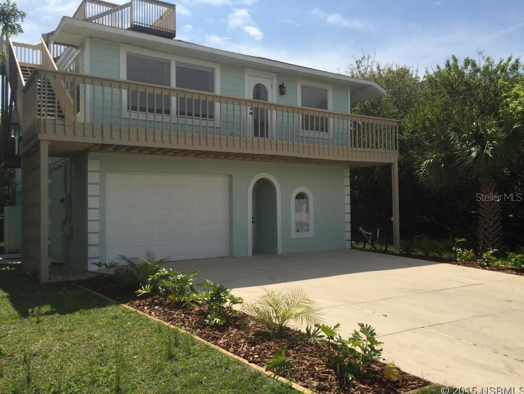 Wow! A beachside house that's move in ready, that's completely remodeled, and only steps to the beach!  Vaulted ceilings, open and airy, bamboo floors, new paint, new roof, and can we talk about this kitchen?!!??  Brand new real wood, soft close, with 42 inch upper cabinets with under cabinet lighting. A huge island and granite in both the kitchen and bathroom. Remodeled bathrooms too.  A private lot that makes you feel like you are in a tree house when looking out your windows. Crow's nest offers beautiful views of the ocean and river.  Also has an in-law suite that has been remodeled as well.  Bring your bathing suits and your toothbrush and move in today. ;Water: City