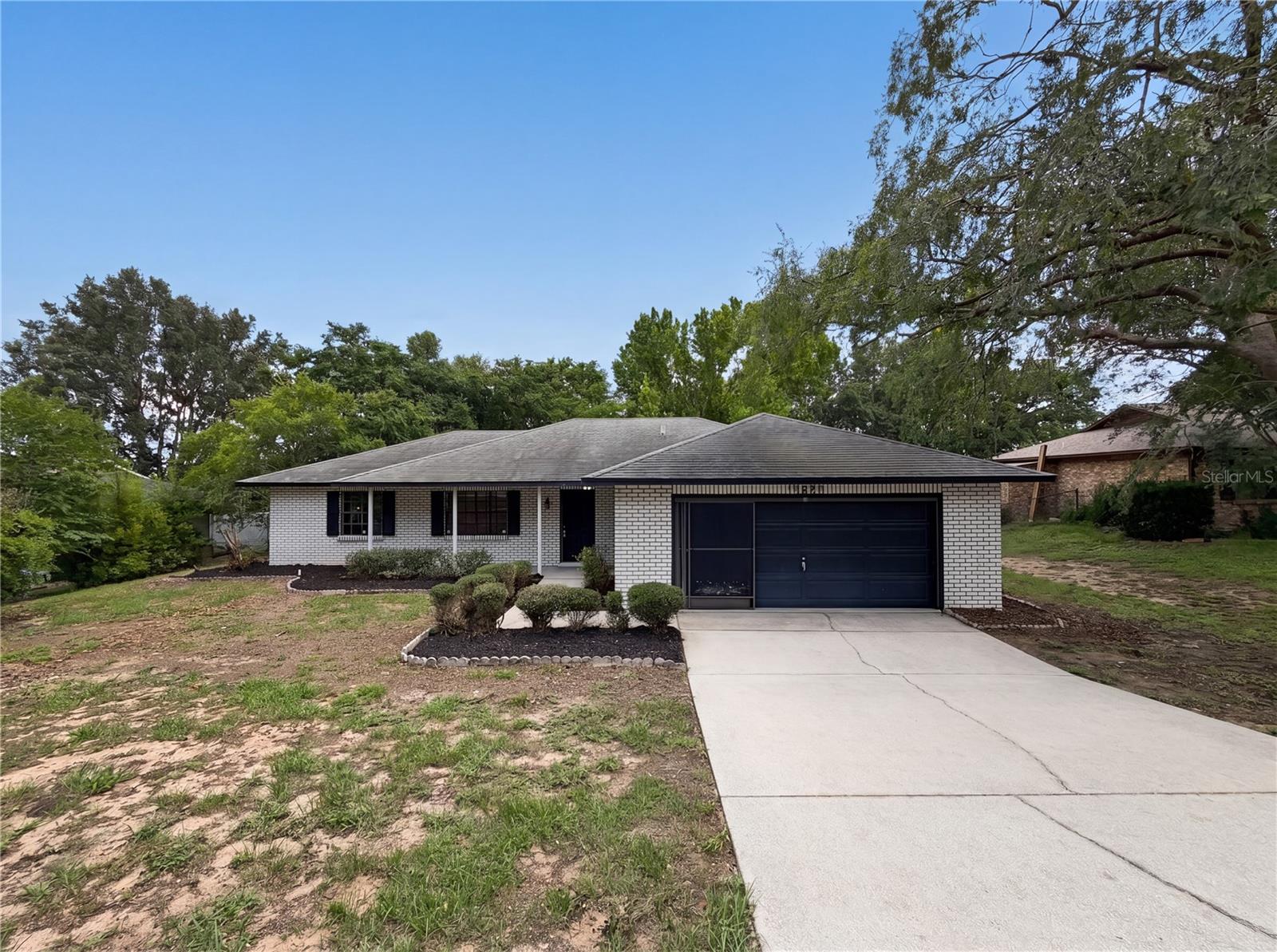 One or more photo(s) has been virtually staged. Welcome to 12620 Bay Hill Dr, a residence recently updated with fresh interior paint and partial flooring replacement throughout its functional layout. The kitchen features all stainless steel appliances, while the primary bedroom includes a walk in closet for organized storage. A covered patio extends the living space to the outdoors. This refreshed residence delivers comfort and functionality—a must-see.. Included 100-Day Home Warranty with buyer activation