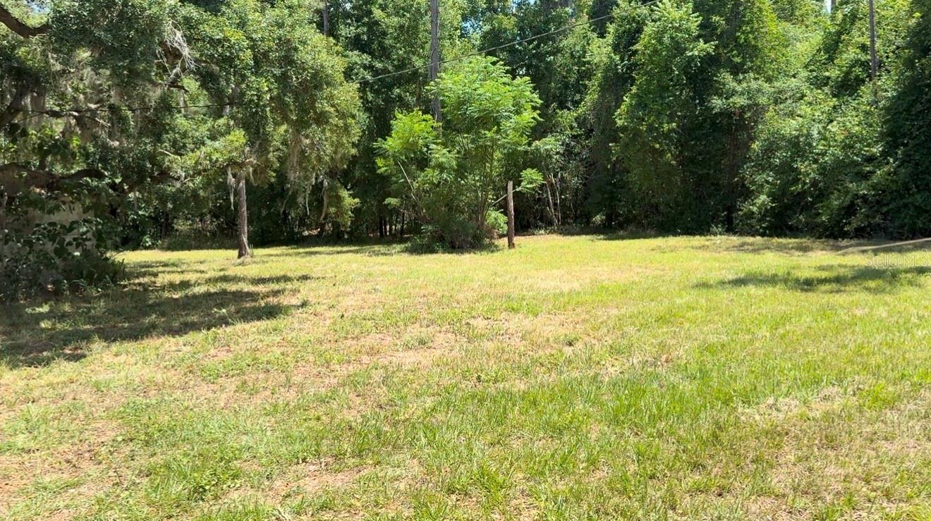 Incredible location and PRICE IMPROVEMENT-PARTIALLY CLEARED and RECENTLY BUSH HOGGED. This 10 ACRE LOT JUST OFF HWY 44 is absolutely perfect for your home build or community. Buildable for your DREAM HOME build. LOW DENSITY classification and BUILDABLE !!! Recent clearing makes your 10 Acres visible from the road on just how deep this lot goes to the back. This high and dry 10 acre oasis is Perfect for YOUR HOME BUILD SITE, or development and Only 18 minutes to THE VILLAGES and only 4 miles to shopping Publix Grocery stores. Additional shopping, dining, and HWY 441 main Street Leesburg is nearby-NO HOA- NO CDD on this land which gives you freedom to do what you wish. Spaciously planted pine trees provide amazing shade and privacy. Electric nearby and Nestled on the easily accessible Whitney Road just off HWY 44 to The Villages and surrounding shopping and dining areas, one of Florida's most popular corridors, this land is perfect for those looking for country living without all the fees. This land offers 331 feet of frontage on Whitney Road. Zoned AG. Your piece of Florida awaits !!