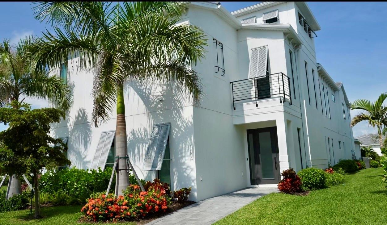 Experience coastal living in the popular Salt Meadow model by Medallion Homes, perfectly positioned in gated Aqua Lagoon community. Ideally located near IMG Academy, IMG Golf & Country Club, Anna Maria Island, Cortez Village, SRQ Airport, UTC Mall and St. Armands Circle, this furnished 4-bedroom, 5-bath residence offers a rare blend of comfort, and convenience.

Thoughtfully expanded by a total of 16 feet, the home offers enhanced living space by 8 feet in the first floor dining room, upstairs den, pool courtyard, and by 8 feet in the oversized 3 car garage. The garage extension was designed with functionality in mind, allowing full driveway parking without encroaching over the alleyway. Additional gestures include heavy-duty wood shelving, a full size refrigerator/freezer, a natural gas fueled whole home generator to ensure peace of mind during power outages.

Every detail of this residence reflects craftmanship. Notable upgrades include a Scotsman sonic ice machine, wine and beverage cooler, and under-counter refrigerator in the dining bar area; an adjustable king-sized bed in the primary suite; and a dramatic $65,000 stairway upgrade featuring hardwood treads and glass walls in entry hall. Additional enhancements include exposed ceiling beams, upgraded front entry lighting, and custom window treatments throughout.

The gourmet kitchen boasts added upper cabinetry, creating a stunning floor-to-ceiling cabinetry wall, while the primary bath impresses with floor-to-ceiling tile, dual rain heads, a handheld shower, and built-in shower bench. The first floor living room is appointed with a wall mounted television, sound bar, and surround sound system, complemented by a large fireplace and mantle for a warm and inviting atmosphere and a dedicated office with barn style doors.

Further upgrades include decorative ceiling treatments in the primary bedroom and kitchen, keyless front and rear entry, a Ring security camera at the front door, and a beautifully designed second floor laundry room featuring a Speed Queen washer and dryer. The office offers custom floor -to-ceiling cabinetry with elegant barn-style double doors, providing both style and functionality. Lot specifically chosen for home to provide 100% privacy in pool courtyard. No homes looking down on you, views are of open space across the front of home and left side of home! 
Outdoor living has furnished patio seating and a liquid propane barbecue grill complete with an additional back up tank, creating the perfect setting for relaxed entertaining.

This remarkable home is a true showcase of luxury upgrades, thoughtful expansion, and timeless design in one of the area's most desirable gated communities.

Walk or take a quick ride over to the 6 acre AQUA LAGOON pool and beach!

Come see for yourself! LOCATION LOCATION LOCATION!