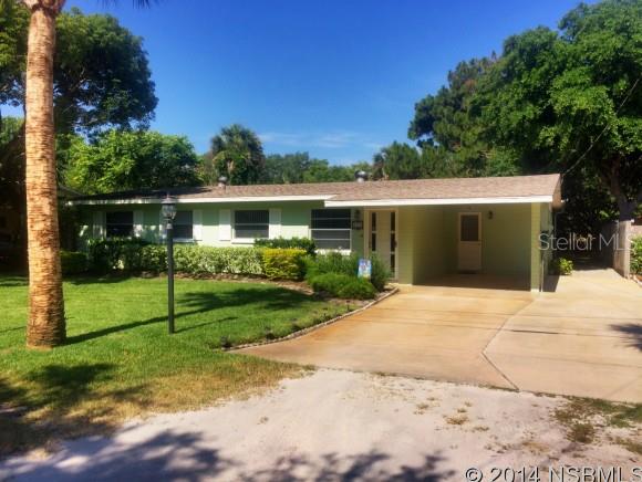 2 BED / 2 BATH CENTRAL BEACHSIDE â Solid concrete block construction, expanded master suite, eat-in kitchen with breakfast bar, formal living room, plus large den/family room! Screened in patio, large backyard w/ fire pit and carport with workshop. Central beachside location means easy access to dining, shopping & entertainment on Flagler Ave & 3rd Ave, brand new marina & restaurant on the North Causeway, historic downtown Canal St, as well as US-1 & the interstate. Be on the beach within just minutes, with multiple beach ramps just down the street! Public boat ramp is nearby too, so the calm waters of the Intracoastal are within your reach as well. What more could you ask for? ;Water: City