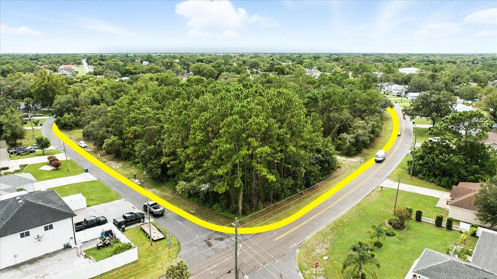 A rare infill development opportunity in the heart of Spring Hill. This 5.5-acre corner parcel has just been rezoned to PDP(SF) and approved for 8 oversized single-family home lots ranging from 21,000–24,000+ sq ft.

Situated on the corner of Linden Dr, Mandrell Ave, and Red Coach St, this site offers triple road frontage, public water access, and minimal flood risk (Zone X with a small shaded AE portion). Septic systems permitted. Drainage retention and open space already incorporated.

No HOA, no CDD, and no parkland dedication required (under 50 dwellings). Phase II permitting is already underway.

Zoned PDP(SF) - 5.5 acres / 8 approved lots - Fully entitled | Great topography - Public water | Septic - Surrounded by stable residential homes - Developer-ready | Appraised $330K pre-rezoning