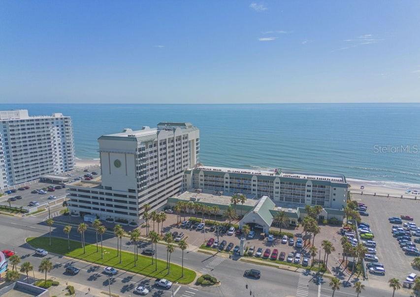 Prime Investment Opportunity. This 339 sq ft completely furnished oceanfront condo studio offers great views, new flooring, and income potential. This unit is enrolled in a rental program and is generating transferable passive income while allowing the owner to enjoy personal use whenever they like. The studio features a king bed, a sitting area with a queen sleeper sofa, a kitchenette, and a spacious bathroom. Guests will love the beachfront location, perfect for activities like paddleboarding, surfing, and relaxing on the sand. Located just 1/2 mile from Andy Romano Beachfront Park, it offers easy access to picnic areas, a splash pad, and family-friendly fun. This property is always in demand with nearby dining, shopping, and entertainment. Resort amenities, including indoor and out door pools, sauna, hot tubs, and gym are open. Invest in oceanfront living, your opportunity awaits!
Private Remarks: Splashpad, second outdoor pool and sea wall are scheduled for repair during 2026.