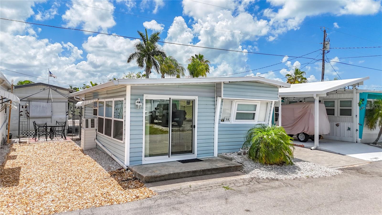 Beautifully Renovated & Fully Furnished Retreat in Paradise Bay Estates! Welcome to your own private escape in the highly desirable 55+ community of Paradise Bay Estates. This charming 1-bedroom, 1-bath home has been completely revitalized following Hurricane Helene (September 2024), featuring a brand-new roof installed in December 2024 and a fully updated interior that feels fresh, modern, and move-in ready.Ideally located just 2 miles from Anna Maria Island, you’ll enjoy easy access by car, bike, boat, or even a relaxing walk to some of Florida’s most stunning beaches.Inside, the home offers a bright, open layout with thoughtfully curated décor and a rare king-sized bed—an uncommon luxury in a one-bedroom home. For guests, the living area includes a comfortable queen sleeper sofa, making hosting easy and convenient.This property is being offered turnkey furnished, so you can step right in and start enjoying the coastal lifestyle from day one.Outside, you’ll find a charming gazebo and a stylish river rock driveway that enhance both curb appeal and outdoor living. It’s the perfect space to relax, entertain, or unwind in the Florida sunshine.Paradise Bay Estates lives up to its name with an active, welcoming community atmosphere. Residents enjoy access to a heated pool and spa, a lively clubhouse, and a full calendar of social events and activities. Take in breathtaking sunset views over Anna Maria Island and Longboat Key from the waterfront gazebos, or simply relax and enjoy the peaceful surroundings and abundant birdlife.Opportunities like this don’t come often—especially at this price point. Schedule your private showing today and start living your Florida dream.
