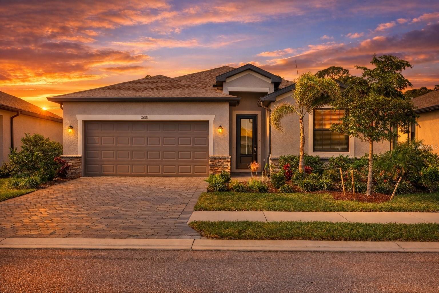 Virtually Staged. Virtually Staged. Move-In Ready, Smart, and Serene — Welcome to Effortless Florida Living. Welcome to this nearly new 4-bedroom, 3-bath residence in the highly sought-after Biscayne Landing community of Port Charlotte. Offering 2,032 square feet of thoughtfully designed living space, this home delivers the perfect blend of modern style, comfort, and low-maintenance living. Bonus: sellers are open to negotiating all furnishings, making this a truly turnkey opportunity. Step through the 8-foot full-glass entry door and take in the open, airy floor plan accented by sleek tile flooring throughout and expansive sliding glass doors that invite natural light and seamless indoor-outdoor living. The contemporary kitchen is a standout, featuring granite countertops, stainless steel appliances, and abundant cabinetry, ideal for everyday living or entertaining guests. A washer and dryer are also included for added convenience. Situated on a private homesite with no rear neighbors, the backyard offers a peaceful retreat. Enjoy your morning coffee or evening gatherings on the screened-in lanai, while the elegant stone accent façade enhances the home’s curb appeal. This home is equipped with smart-home technology, including a Ring doorbell, security features, a WiFi-programmable thermostat, and a WiFi-enabled garage door opener—providing both convenience and peace of mind. The HOA elevates your lifestyle by covering lawn maintenance, internet, and cable, allowing you to truly relax. Residents also enjoy resort-style amenities such as a fitness center, heated pool, pickleball courts, and a covered gathering area, all connected by sidewalks throughout the community. Just over three years old and lightly lived in by seasonal owners, this home feels virtually brand new. Ideally located near Charlotte Sports Park, North Port, and all that Port Charlotte has to offer—especially with Spring Training just around the corner. This is one of Biscayne Landing’s best opportunities—add it to your must-see list today.