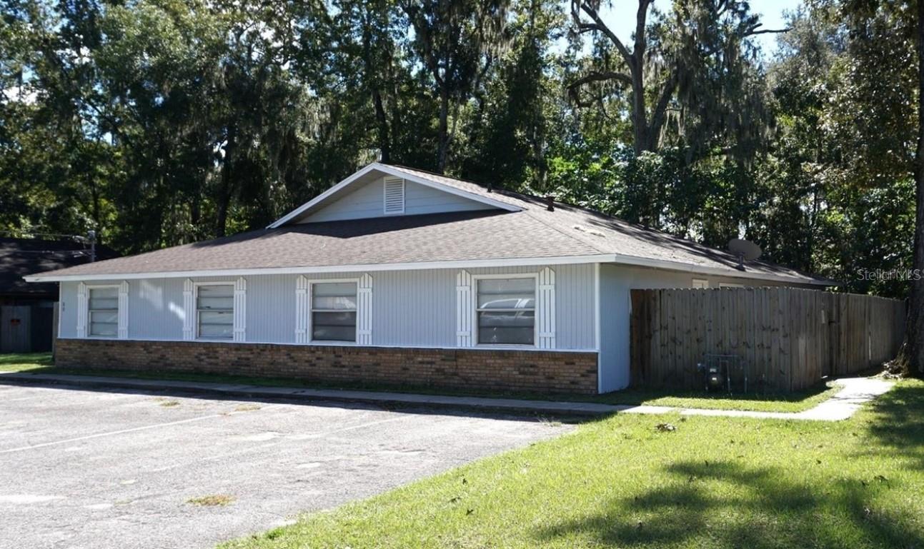 Investor-ready quadplex in the heart of Ocala! This fully occupied, income generating property features four spacious 2-bedroom units, each with 1 bathroom and separate metering. With a total of 3,233 heated Sq Ft and a solid rental history, this fee simple asset offers immediate cash flow. Situated on a 0.28-acre lot in Citrus Park, the building boasts durable wood siding, shingle roof, and central air. Interior finishes include tile, vinyl, and laminate flooring. Zoned R-3 and located in Flood Zone X, this property combines stability, scalability, and long-term upside. Minutes from SE Maricamp Rd and major conveniences. No HOA, no special sale conditions — just a clean, performing investment.
