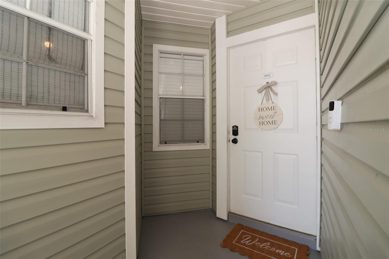 Welcome to your new home at Stones Throw: where comfort, convenience, and the Florida lifestyle come together beautifully. This meticulously maintained first-floor condominium has been owner occupied and thoughtfully cared for, offering move-in-ready ease from the moment you step inside.

Luxury vinyl flooring flows throughout the main living areas, while the bedrooms feature plush carpet in pristine condition. The spacious dining area opens seamlessly into the kitchen and living room, creating an inviting layout perfect for entertaining or quiet evenings at home.

Natural light pours into the living room, which overlooks your private screened-in patio; the perfect spot for morning coffee or winding down after a day at the beach. The patio also features a generously sized storage closet ideal for beach gear, bikes, gardening supplies, or holiday décor.

The kitchen offers stainless steel appliances, a pantry, abundant cabinet and counter space, and enough room for a charming bistro table to create a cozy eat-in dining nook.

Designed with privacy in mind, the split-bedroom floor plan is ideal for guests, roommates, or working from home. The primary suite is a peaceful retreat featuring sliding glass doors to the patio, a large walk-in closet, and an ensuite bath with double sinks, generous vanity space, and excellent lighting. The shower/tub and toilet are tucked behind a separate door for added functionality and privacy.

The second bedroom is located near the front of the home and offers plush carpeting, a built-in closet, and convenient access to the guest bathroom with a shower/tub combination. The laundry closet is located just outside the bathroom for everyday convenience.

Beyond your front door, enjoy resort-style community amenities including a beautifully lit pool for evening swims, hot tub, tennis and pickleball courts, and direct access to the Pinellas Trail for biking, jogging, and enjoying the outdoors. Centrally located in St. Petersburg, Stones Throw places you just minutes from Gulf beaches, shopping, dining, and everything that makes living in St. Pete so desirable.

Seller to contribute $5,000 towards buyer's closing costs with full asking.