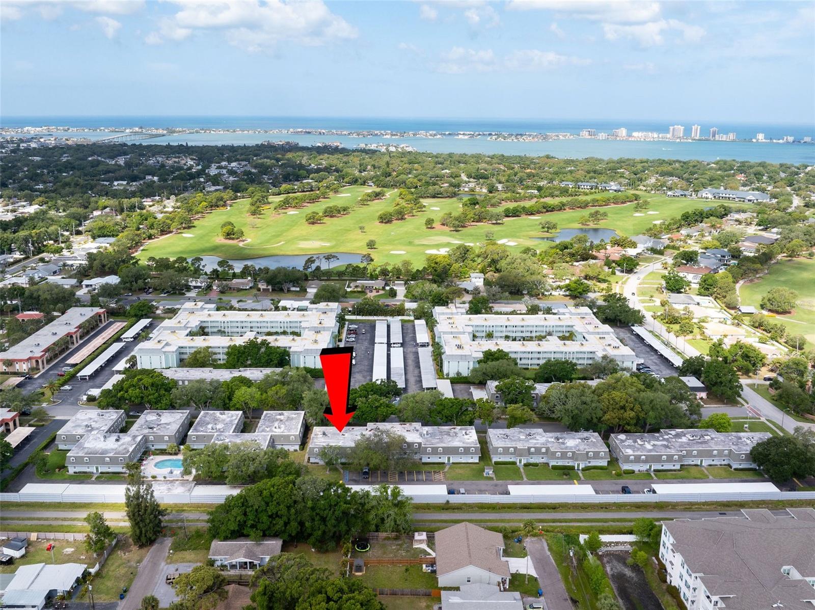 One or more photo(s) has been virtually staged. Welcome to Belleair Forest — a beautifully updated first-floor condo offering comfort, convenience, and an unbeatable Belleair location. This light and bright 2-bedroom, 2-bathroom residence features an open-concept layout with spacious living and dining areas that flow effortlessly. The dining space overlooks community green space, perfect for morning coffee or relaxing evenings.

The kitchen is designed for both style and functionality, offering ample cabinetry, great counter space, and a clean feel. Both bedrooms are generously sized, with the primary suite featuring an en-suite bathroom and plenty of closet storage. Additional perks include in-unit laundry, assigned covered parking right outside your door, and a well-maintained community known for its peaceful setting and mature landscaping.

Belleair Forest is a sought-after neighborhood located just minutes from world-renowned beaches, top-rated golf courses, the Belleair Recreation Center, restaurants, and everyday conveniences. Whether you're looking for a full-time home, seasonal retreat, or investment property, this condo offers an exceptional opportunity in one of the area’s most desirable communities.