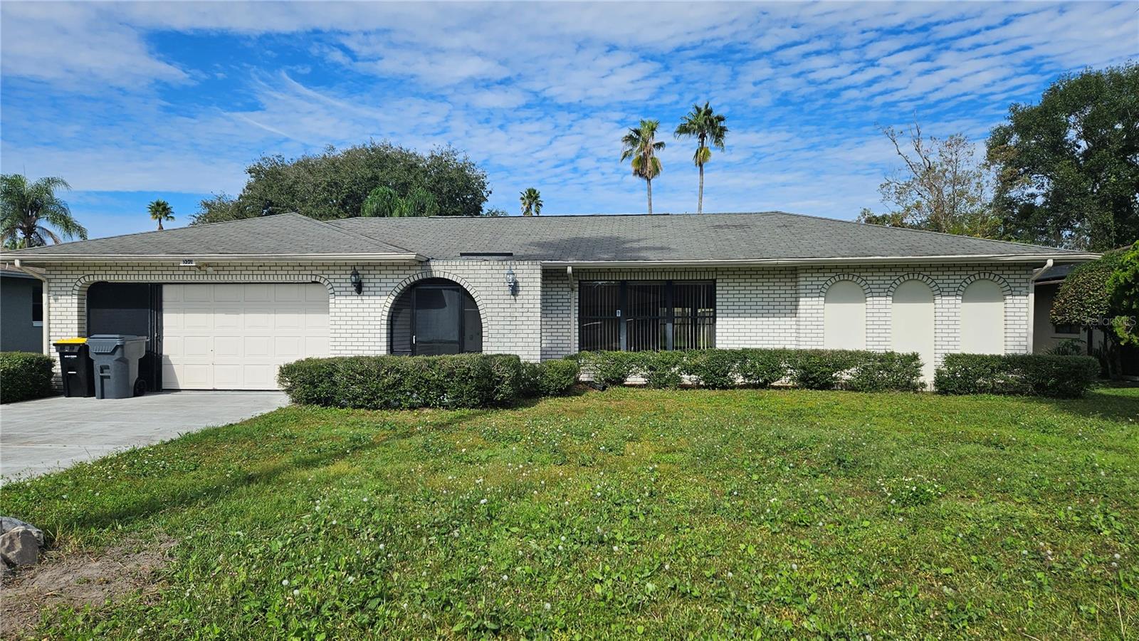 Every once in a while you come across a property that has been loved. That is the case with this four bedroom, two and a half bathrooms home. The very well preserved and care for home boast expansive areas to gather and entertain. An over sized enclosed screened patio, which is the jewel of the home, extends the living outside while maintaining privacy and intimacy. The floor plan flows seemingly with the kitchen being the heart of it all. Enjoy the comfort and privacy offered by having a very well designed split floor plan, with the primary room occupying its own section away from secondary rooms. One of the secondary bedrooms has a half bathroom within, making this space perfect for an office or a guest room. Plenty of storage space? You got it. A two car garage? Sure! The price is right, the location is right, the size is right. Low HOA? Absolutely! Don't miss this opportunity, schedule your showing right away!