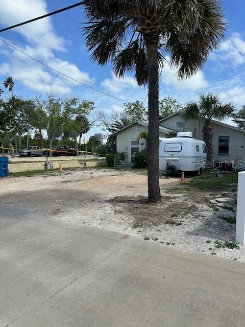 This is a land opportunity in one of the most desirable boating locations on the Treasure  Island.  The existing structure is a tear down. The value is in the lot and the waterfront position.
The property offers a 46 by 100 lot with 50 feet BEYOND THE DOCK deeded into the water, giving you control and flexibility to build with confidence. The dock was repaired after the 2024 storms and includes a 10,000 lb lift. The water is deep, protected, and positioned for serious boating. You are just off John’s Pass, which means fast access to the Gulf and an easy ride to multiple waterfront restaurants.
The street is quiet and set back from Gulf Blvd, reducing traffic while still keeping you close to beaches, dining, and daily conveniences.
Zoning allows for single family or duplex, which opens the door for personal use, income production, or a combination of both. Public water and sewer are in place. The existing structure already has 200 amp service, which can simplify your planning process.
Many properties in Treasure Island are coming to market following the 2024 storm season. What sets this one apart is the combination of boating depth, protected water, proximity to the Pass, and flexible zoning. Those four factors are difficult to find together.
