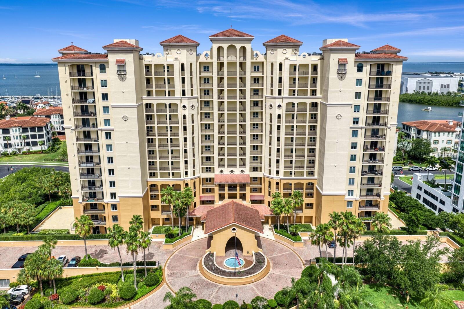 Enjoy breathtaking water views and spectacular sunsets from this beautifully renovated penthouse residence in Castillo Tower at Westshore Yacht Club. Located on the exclusive 16th floor, this 3 bedroom, 2 bath home features soaring 11 foot ceilings, available only on the penthouse level, a private elevator entry into your own foyer, elegant marble flooring, hurricane impact windows and sliding glass doors, and a spacious private balcony overlooking Tampa Bay. Offering the best of both worlds, this exceptional residence enjoys breathtaking sunsets over Tampa Bay and beautiful city views with stunning sunrises. The thoughtfully designed split bedroom floor plan offers both privacy and functionality, with a spacious great room at the center of the home opening seamlessly to the balcony, creating the perfect setting for everyday living and entertaining. The kitchen is open to the living area while maintaining its own defined space, and the private primary suite is thoughtfully separated from the guest bedrooms for added comfort. The spacious primary suite also features two generous walk in closets, offering exceptional storage and organization. The chef's kitchen is equipped with premium Wolf appliances, including an induction cooktop, oven, and microwave, complemented by a full suite of Sub Zero refrigeration, including a refrigerator, wine refrigerator, and beverage refrigerator, along with a Bosch dishwasher, solid wood cabinetry extending to the ceiling, marble countertops, a reverse osmosis drinking water system, and a water softener. Extensively renovated with premium finishes, the residence showcases designer lighting, beautifully updated marble bathrooms with premium fixtures and Toto® toilets, roller shades throughout, motorized in the living room, a custom Roman shade in the kitchen, a tankless electric water heater, a climate controlled storage unit, and two assigned parking spaces, including one EV ready space. Castillo Tower amenities include a heated pool and spa, fitness center, steam room and sauna, private movie theater, social rooms with a catering kitchen, outdoor grilling pavilion, guest suites, bicycle and kayak storage, on site management, and cable, high speed internet, water, sewer, and trash service. Residents also enjoy exclusive access to the Bay Club at Westshore Yacht Club, featuring two resort style pools, waterfront dining, a state of the art fitness center, Compass Day Spa, Tiki Bar, a 149 slip marina, parks, a dog park, and a vibrant social calendar within a 24 hour guard gated waterfront community.