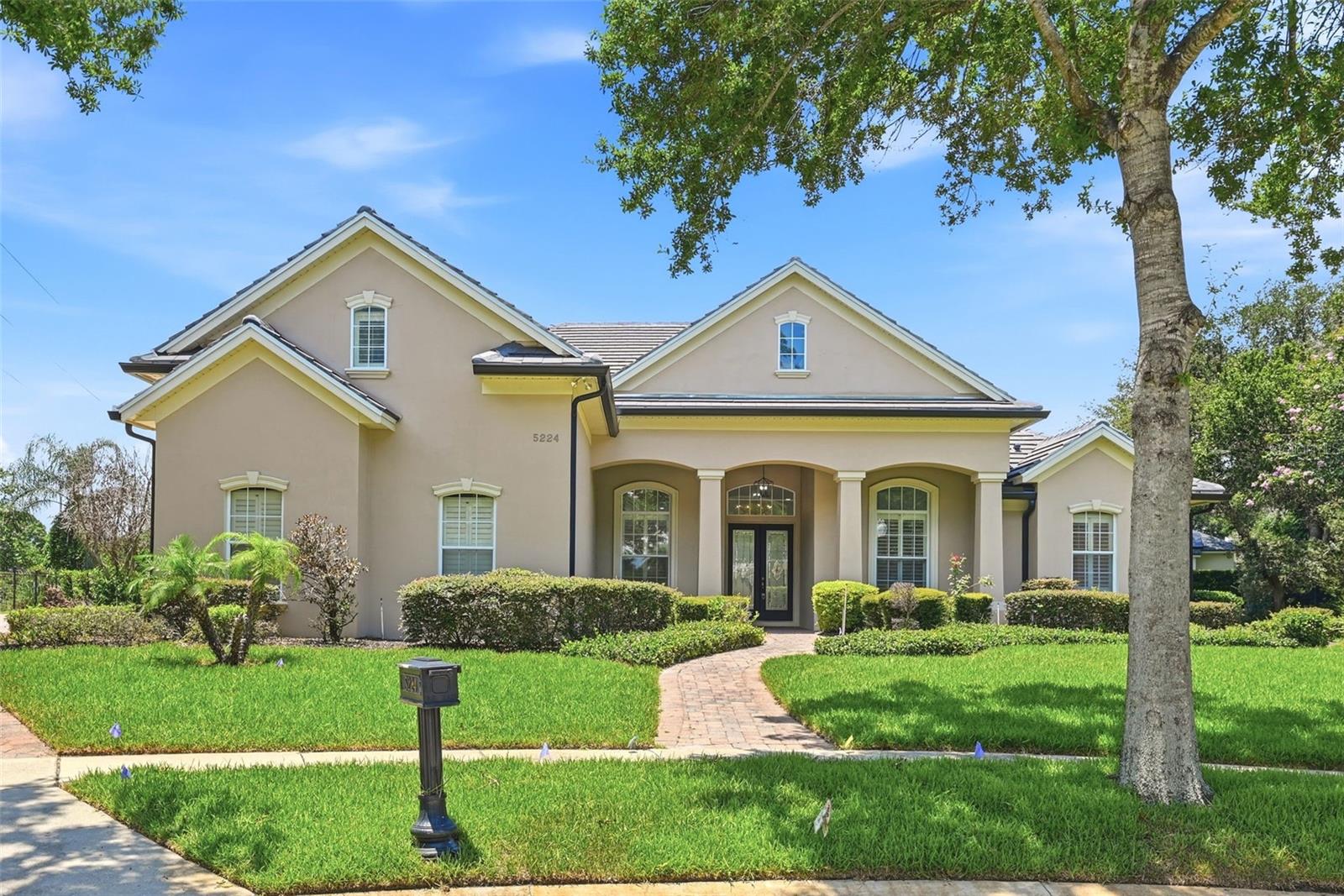 Opportunities like this don’t come available often…Tucked away in the exclusive, quiet community of Vistamere, this stunning custom-built 5-bedroom, 3.5-bathroom home offers a rare opportunity for luxury leasing. Freshly updated with new interior paint, brand-new appliances, and modern window treatments, this property seamlessly combines style, comfort, and convenience. Gorgeous tile flooring runs throughout the entire home—creating a crisp, seamless look and making daily cleanup a breeze. Inside, you’re welcomed by a formal living room with pool views and a spacious dining room—perfect for hosting guests and family. Tucked privately off the foyer, providing the ultimate environment for work-life balance. The Kitchen and Living Room areas are the heart of the home showcasing granite countertops, 42” solid wood cabinets, and premium stainless-steel appliances—including a brand-new glass cooktop, wall oven, and microwave. Enjoy casual meals at the breakfast bar or the sunny dining nook. Slide open the glass doors from the family room, nook, or primary suite to access a private, screened lanai and pool deck. The pavered deck and secluded backyard offer the perfect backdrop for relaxation. The luxurious primary suite features private outdoor access and an en-suite bath plus an oversized walk-in closet with custom closets. Upstairs, a massive fifth bedroom with its own half bath offers excellent flexibility as a guest suite, media room, or bonus lounge. Live just minutes away from Dr. Phillips’ famous Restaurant Row, premium shopping, and world-renowned theme parks. To top it off, this home is zoned for top-rated local schools. Call today before another family call this property home!