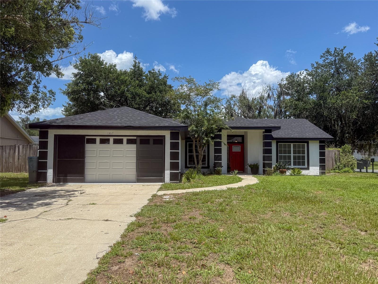 Completely renovated from top to bottom, this stunning home is truly move-in ready! Situated on a spacious corner lot in an established DeLand neighborhood, you'll enjoy the charm of a mature community with the peace of mind of today's modern updates.

Step inside to an open and inviting floor plan featuring luxury vinyl plank flooring, fresh interior and exterior paint, designer lighting, and a show-stopping kitchen complete with quartz countertops, shaker cabinetry, stylish tile backsplash, oversized island with seating, stainless steel appliances, and a sleek vent hood. The beautifully renovated bathrooms offer modern vanities, quartz countertops, and upscale finishes that create a spa-like feel.

Major improvements include a NEW roof, NEW HVAC system, NEW kitchen, NEW bathrooms, NEW flooring, NEW cabinetry, NEW appliances, and fresh paint throughout, allowing you to move in without the worry of costly renovations.

Outside, enjoy a fully fenced backyard with a covered patio that's perfect for relaxing, entertaining, or weekend BBQs, along with the added privacy and space that comes with a desirable corner lot. The attached two-car garage provides plenty of storage and convenience.

If you've been searching for a home that combines timeless style, quality craftsmanship, and major upgrades already completed, this is one you won't want to miss. Schedule your private showing today!