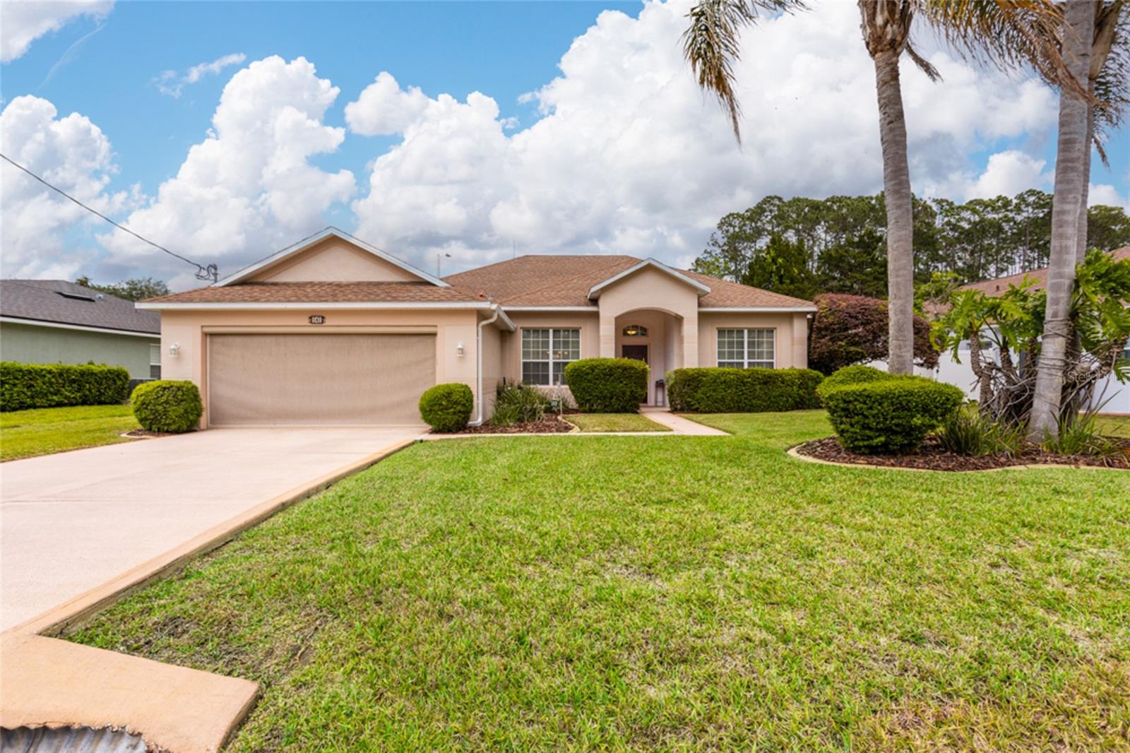 Beautiful one-owner pool home located in desirable Cypress Knolls, Palm Coast's sought-after "E" Section. This well-maintained home features a formal living and dining room, a spacious family room, a generously sized kitchen with quartz countertops, and an eat-in kitchen overlooking the pool. This home has a split floor plan. The primary suite offers plenty of space plus a private flex space ideal for an office or a sitting area. Spacious walk-in closet. The primary bathroom has a garden tub, a walk-in shower, and a glass block window for natural light. The second bath serves as a convenient pool bath. Additional features include a whole-house water softener system, a partially fenced backyard, and a sprinkler system on city water. Oversized garage with storage. The pool equipment is newer. Enjoy comfortable Florida living with plenty of space for relaxing and entertaining.