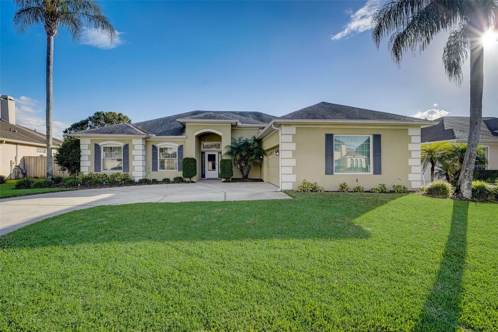 Welcome home to this beautiful Belle Isle home located in the Conway Groves community. Tucked up on a cul-de-sac street, this 4-bedroom, 3.5-bathroom open floor plan home is spacious enough for your growing family. As you enter, you’ll find the formal dining room at the front flowing into the large living room. Oversized windows and sliding glass doors at the back of the home draw in the natural light with 10-foot ceilings elevating the space throughout. The kitchen located off the dining room features granite countertops, stainless steel appliances, and additional eat in space by the sliding glass doors. The spacious primary bedroom offers tray ceilings, sliding glass doors leading directly out back, and a beautiful ensuite with double vanities, soaking tub, and glass enclosed stand up shower. Outside is the perfect screened patio overlooking the spacious green space that is a blank canvas waiting for your backyard dreams to come true that is fully fenced in! Easy access to SR-528, and conveniently located less than 20 minutes to downtown Orlando, Orlando International Airport, Lake Nona Medical City, and Orlando area attractions and only minutes away from Lake Conway Chain of Lakes. Don't miss out on the opportunity to make this delightful home in Belle Isle yours. Schedule a showing today and experience the perfect blend of comfort, convenience, and community living.