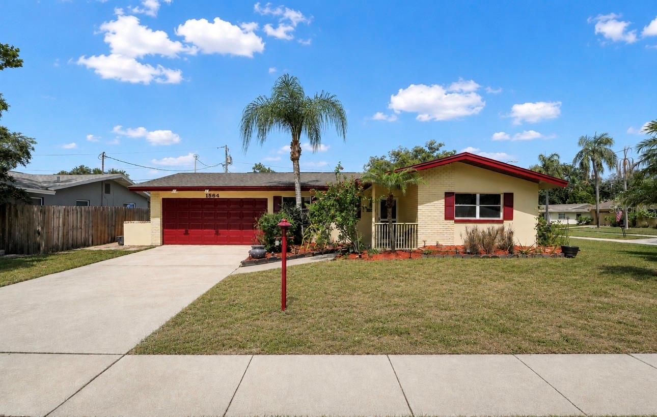 Welcome to the heart of charming Dunedin, where comfort, character, and the ultimate Florida lifestyle come together! Perfectly situated on a spacious corner lot, this beautifully maintained 3 bedroom, 2 bath home is just a golf cart ride to vibrant Downtown Dunedin, offering the perfect blend of privacy, convenience, and timeless appeal.

Inside, you’ll find a desirable split bedroom floor plan designed for both comfort and functionality, along with a versatile office/bonus room that’s ideal for working from home, a playroom, fitness space, or guest retreat\. The updated kitchen serves as the heart of the home, while stunning exposed brick wall accents throughout add warmth, character, and a unique touch that sets this home apart.

Step outside and discover your own private oasis\. The expansive, fully fenced backyard provides plenty of room for pets, play, gardening, or even a future pool. The show stopping outdoor fireplace creates the perfect gathering space for entertaining family and friends or simply relaxing under the stars on cool Florida evenings\.

Located just minutes from Downtown Dunedin’s award winning restaurants, breweries, boutique shopping, waterfront parks, marinas, festivals, the Pinellas Trail, and world famous Gulf beaches, this home offers an unmatched lifestyle in one of Tampa Bay’s most sought after communities.

Whether you’re searching for your forever home, a seasonal retreat, or simply a place to enjoy everything Dunedin has to offer, this exceptional property combines charm, modern updates, generous outdoor living, and an unbeatable location. Don’t miss this rare opportunity to make it yours!