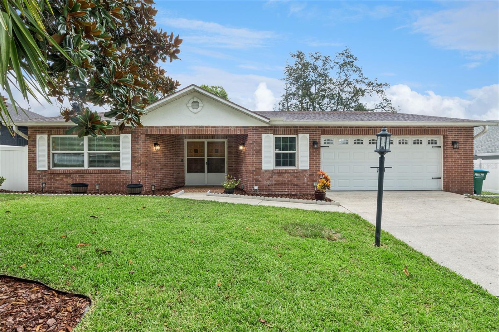 Welcome home to this beautifully maintained 3-bedroom, 2-bath residence offering 1,518 square feet of comfortable living space on an oversized 0.22-acre lot with NO HOA! From the moment you arrive, you'll appreciate the pride of ownership and numerous updates that make this home truly move-in ready.
The inviting interior features luxury vinyl wood plank flooring throughout the main living areas and bedrooms, with tile in the bathrooms. The entire home boasts newer Pella windows that fill the living spaces with abundant natural light while enhancing energy efficiency. The kitchen is designed for both everyday living and entertaining, featuring granite countertops and newer stainless steel appliances installed in 2023.
Step outside to the spacious screened-in porch overlooking your large, fully fenced backyard—perfect for relaxing, hosting family and friends, or giving pets and children plenty of room to play. A large storage shed provides excellent space for lawn equipment, gardening tools, or additional storage.
The oversized 2-car garage offers abundant storage space, and additional fridge, a pull-down attic stairs for easy access, and a super spacious laundry area complete with a washer and dryer, both replaced in 2023.
Recent improvements provide peace of mind, including a new water heater (2023), new front yard landscaping package with irrigation, sod, mulch, and plants (2023), updated ceiling fans and light fixtures (2024), and fresh interior paint throughout the home in 2026, with the exception of the primary bedroom. The home is also wired for a whole-house generator, providing added convenience and preparedness.
Ideally located with quick access to I-4, you'll enjoy an easy commute while being less than 45 minutes from Florida's beautiful beaches and just minutes from shopping, dining, parks, and everyday conveniences.
If you're looking for a well-maintained, updated home with generous outdoor space, modern upgrades, and an unbeatable location, this Deltona gem is one you won't want to miss. Schedule your private showing today!