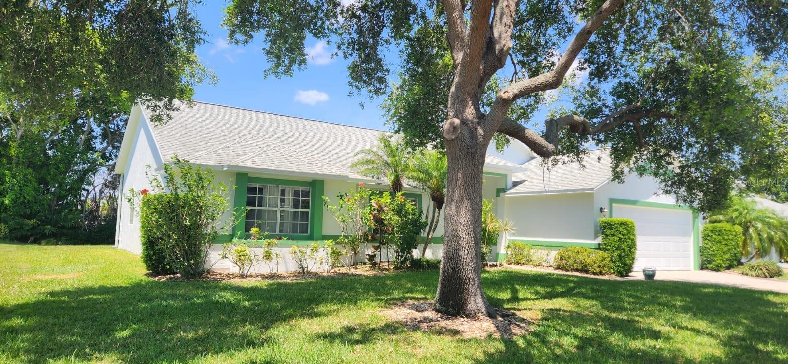 Location, Community & Top Viera Schools! This stunning home features a desirable split floor plan with tile and laminate flooring throughout (no carpet!). The layout offers formal living and dining rooms, alongside a comfortable family room and breakfast nook. The private master suite boasts a spacious walk-in closet and an ensuite bath with a double sink and a shower/tub combo. Fully equipped with a washer and dryer. Enjoy outdoor living on the beautiful screened-in lanai looking out to an oversized, gorgeous backyard. Situated in an immaculate community—this property is a must-see!