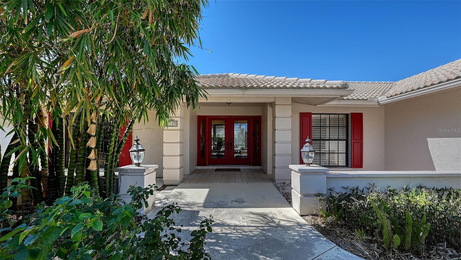Welcome to 1109 Delacroix Circle in the HIGHLY COVETED Sorrento Woods neighborhood where elegant interiors and exceptional community amenities create a truly elevated lifestyle. This 4 Bedroom, 3 Bathroom home with over $115,000 in upgrades, includes an office, pool and boasts open concept living and the In-law Suite offers options of MULTI-GENERATIONAL LIVING too. A stunning 2024 custom kitchen anchors the home with quartz countertops, pot filler, double ovens, wine fridge, and designer lighting—perfectly positioned between the formal dining room and the spacious family room with sliders to the lanai. The formal living room impresses with a tray ceiling, crown molding, plantation shutters, French doors, and an in wall sound system. The primary suite offers a serene retreat with custom built ins, lanai access, and a spa inspired ensuite wrapped in granite, featuring a rain shower, wavy cut glass doors, built in shelving, bidet, and skylight. A second master/in law suite with its own ensuite and skylight provides ideal multigenerational flexibility. Guest bedrooms include custom closets, crown molding, and plantation shutters, while the cabana bath offers pool access, granite counters, and a rain shower. Additional highlights include cherry hardwood flooring in the foyer, hardwood in the dining room, recessed lighting throughout, a custom cabinet office, a spacious laundry room with utility sink and wood flooring, and a plywood reinforced attic offering exceptional storage. The screened lanai and resurfaced pool create a private outdoor oasis perfect for entertaining. Sorrento Woods elevates the lifestyle with a PRIVATE COMMUNITY BOAT RAMP and day dock on a scenic canal—placing the Gulf and Intracoastal Waterway just minutes away. Low HOA, NO CDD, and a central location close to the new SMH Venice Hospital, Nokomis and Venice Beaches, Legacy Trail, shopping, dining, and A rated schools make this an unmatched opportunity in Sarasota County.