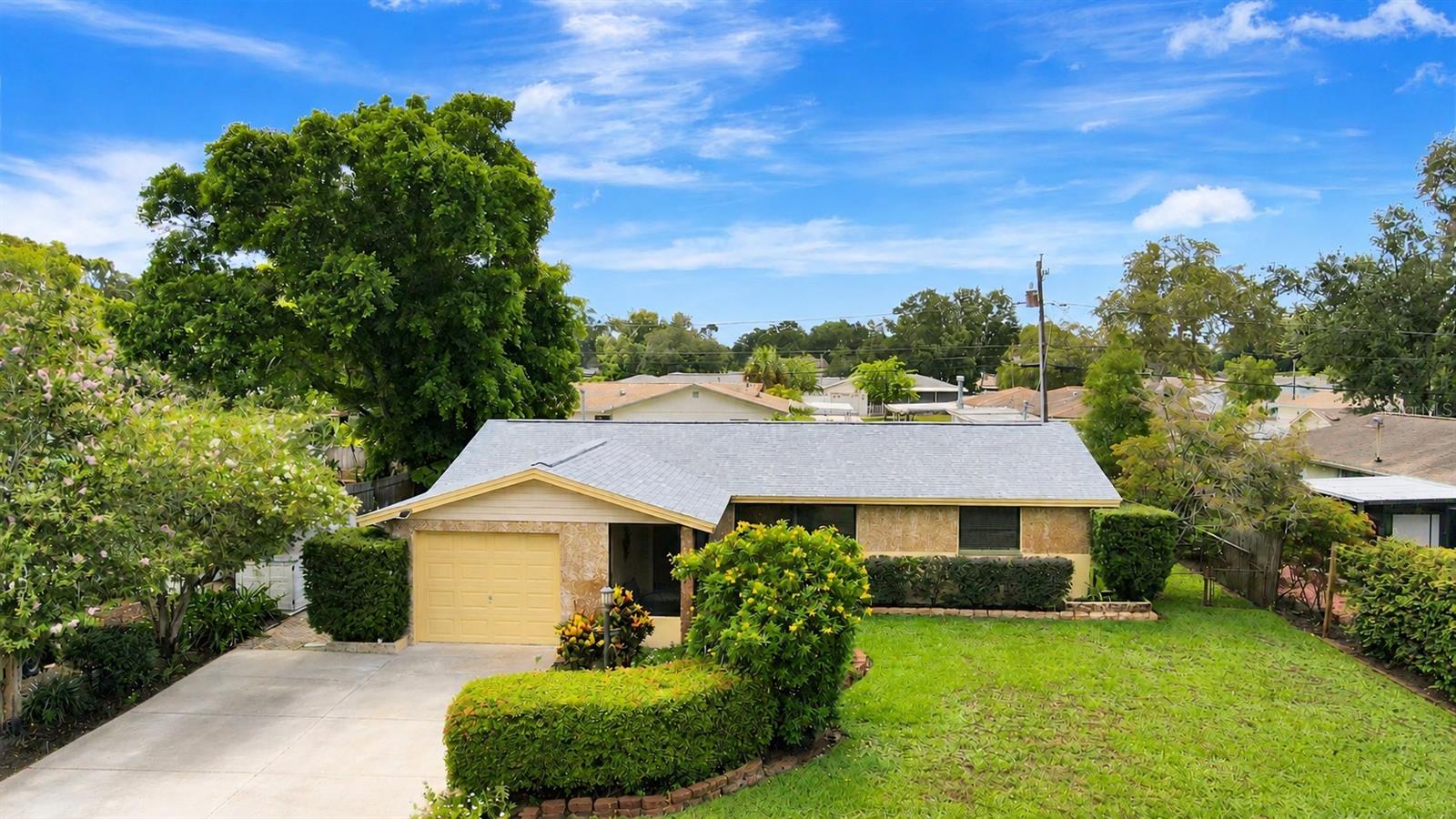 Welcome home to this beautifully maintained 3-bedroom, 2-bathroom single-family home in the heart of Seminole! Featuring a brand-new roof (2025) and hurricane shutters, this home offers the peace of mind every Florida homeowner is looking for.

Inside, you'll love the open-concept kitchen, perfect for entertaining family and friends, featuring wood cabinetry, stainless steel appliances, and quartz countertops. The desirable split floor plan provides privacy for the primary suite, which also features a beautifully updated bathroom with quartz countertops. The secondary bathroom is finished with granite countertops. Two separate living areas provide incredible versatility, offering the perfect spaces for relaxing, entertaining, working from home, or creating a playroom.

One of the home's standout features is the thoughtfully converted garage, creating a flexible bonus room that's ideal for a home office, gym, playroom, or media room. There's still approximately 8.5' x 12' of dedicated storage space remaining in the garage.

Enjoy Florida living year-round from the screened lanai overlooking the fully fenced backyard. Additional highlights include fresh exterior paint, a portable generator, and an irrigation system with a shallow well to help keep your lawn beautiful while reducing water costs.

Located in unincorporated Pinellas County, this property allows short-term rentals, making it an outstanding opportunity for investors as well as first-time homebuyers, snowbirds, or those looking to downsize. With an unbeatable price point for a single-family home in Seminole, this one is sure to attract attention. Schedule your private showing today!