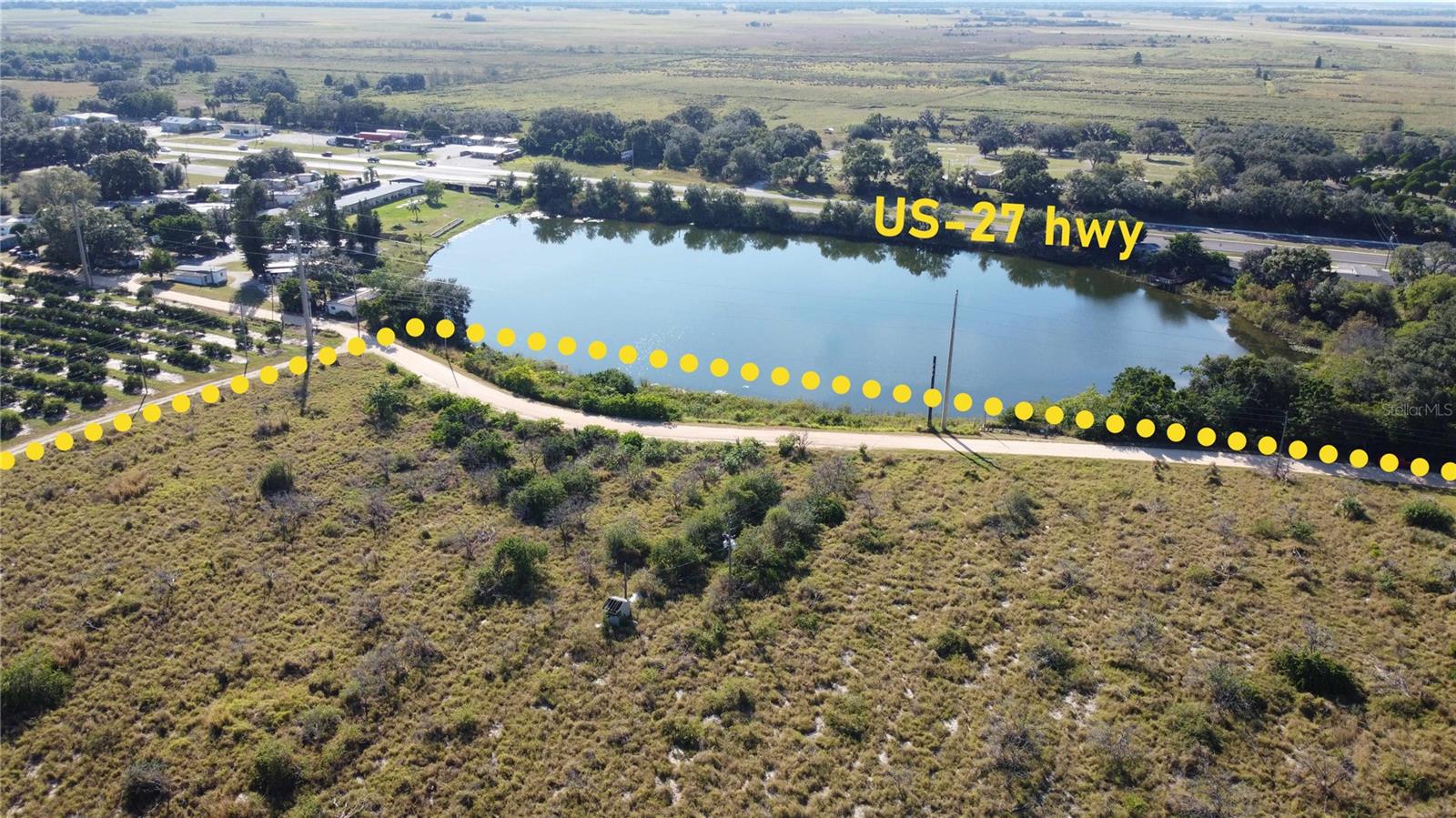 One or more photo(s) has been virtually staged. *** PRICE JUST REDUCED*** Explore this 9.5-acre residential parcel offering stunning views of Lake Altamaha and direct visibility to US Hwy 27. Ideally located within walkable distance to both US Hwy 27 and SR 60, this property combines natural beauty with unbeatable convenience. Zoned for residential use, it’s perfect for building homes in a growing community. Enjoy easy access to shopping, dining, banking, and essential services—all just steps away. With unlimited potential and a prime location, this is a rare opportunity you don’t want to miss.