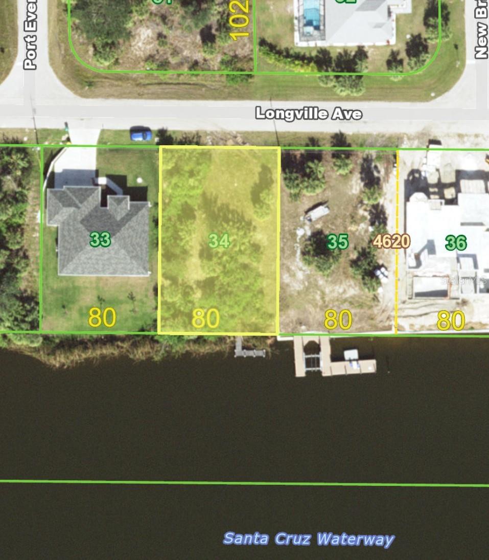 Wow! Highly sought after southern exposure on a deep draft sailboat water canal on the Santa Cruz Waterway with Sailboat access to Charlotte Harbor. Dock is already in place, So you can dock your boat and enjoy the waters of Charlotte Harbor while you plan your future waterfront dream home with views of the wide Santa Cruz waterway. The Santa Cruz waterway is one of the widest canals in the area and can accomadate very large vessels. Water, Electric and Sewer available in area of newer homes. Looking to build a multi famly. This is zoned to do so
