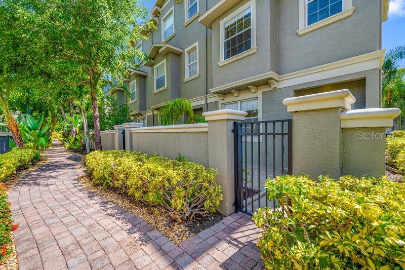 There's room to roam in this lovely and Bright  3 Bedroom Townhome located in lovely Bayou Grande. This unit features 2 full baths and 2 half baths, a great eat-in kitchen featuring stainless steel appliances , oak cabinets and a walk-in pantry, a Bonus Room on the first level which can be a family room or home office. All Bedrooms on the third level. The master bath has a garden tub as well as a separate shower. This end unit has lots of windows throughout making this home very light and bright. Two car attached garage. Private patio/courtyard for outdoor enjoyment. Beautifully landscaped grounds with a delightful pool to enjoy. Bayou Grand is a gated community. The awesome Seminole City Center with great restaurants, move theater and shops is right around the corner. This property has a lot to offer. Call to set up a showing today!