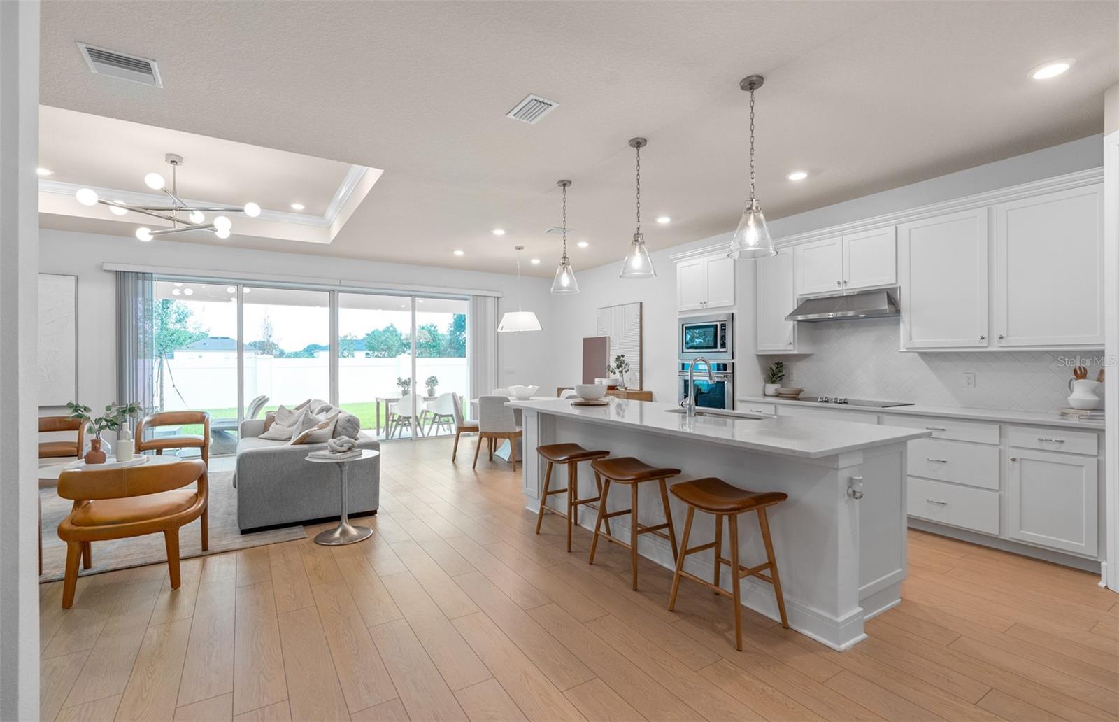 Welcome home to Hartford Terrace in Davenport! A new community in the flourishing city of Davenport will feature a collection of single-family homes and townhomes with a variety of onsite amenities and a location near everything – shopping, dining, entertainment, schools, and major highways. Located just off Highway 27, Hartford Terrace offers Smart Home technology in all homes, a resort style community pool with cabana, a sports field, playground, dog stations, walking trails, and 1-Gig high speed internet and streaming TV included in the HOA.
The new construction quick move-in two-story Winthrop home enjoys- 4 bedrooms, 3 full bathrooms, a powder room, an open-concept kitchen, café, and gathering room, a flex room, a spacious loft, a covered lanai and a 2-car garage. Upon entry, you are greeted by the flex room and powder room. The stunning foyer continues past the laundry room towards the kitchen, gathering room and café - which overlook the covered lanai thanks to the pocket sliding glass door. The Winthrop’s kitchen features a corner walk-in pantry, a large center island, Whirlpool stainless-steel appliances-including a refrigerator, microwave vented to the exterior, elegant Elkins White cabinets, a decorative tile backsplash, and quartz countertops. The owner’s suite is located on the main level of your home and features an en suite bathroom with a walk-in closet, dual sinks, a double quartz-topped vanity, a private water closet and a glass enclosed shower. Upstairs you'll find your spacious loft, three bedrooms, and two bathrooms. Professionally curated design selections include tile flooring in the main living areas, bathrooms, and laundry room and Shaw brand stain-resistant carpet in the bedrooms and loft. Enjoy the convenience of modern living with a smart thermostat, video doorbell, and LED downlighting. This home includes everything you need to get started—refrigerator, washer, dryer, and blinds—so you can relax and enjoy the luxury of your new home from day one. With its stunning design and thoughtful touches, the Winthrop home provides the perfect blend of luxury and functionality for today’s lifestyle.