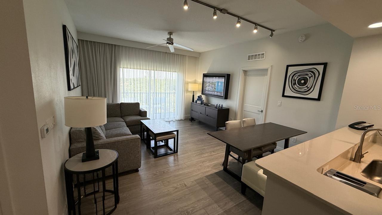 Turn-Key, Fully Furnished 3-Bedroom Condo at The Grove Resort & Water Park — Steps from the Water Park

Positioned on a high floor, this spacious residence offers serene views from a private screened balcony—the ideal setting to relax after a day enjoying the nearby attractions. Inside, the open-concept layout seamlessly connects the living, dining, and kitchen areas, featuring quartz countertops, stainless steel appliances, and a fully equipped setup designed for both comfort and practicality.

The primary suite delivers a refined retreat with a king-size bed and an en-suite bathroom complete with double vanity, soaking tub, and glass-enclosed shower. Two additional bedrooms, each with queen-size beds, provide ample space and privacy for guests and family.

Living just moments from the Surfari Water Park means you’re only a short walk away from water slides, the FlowRider® surf simulator, lazy river, and resort-style pools—making this unit especially attractive for both personal use and short-term rentals. Beyond the water park, enjoy access to Lake Austin, on-site dining, spa services, fitness center, and a full suite of entertainment amenities.

This condo-hotel offers a fully managed, hands-off investment model, with a professional on-site team handling rentals, maintenance, and guest services. HOA fees conveniently include utilities such as electricity, water, cable, and high-speed internet.

Whether you're seeking a vacation home with unmatched convenience or a high-performing income property, this residence stands out for one key reason: location within the resort—just steps from the water park, where demand is highest and experiences are unforgettable.