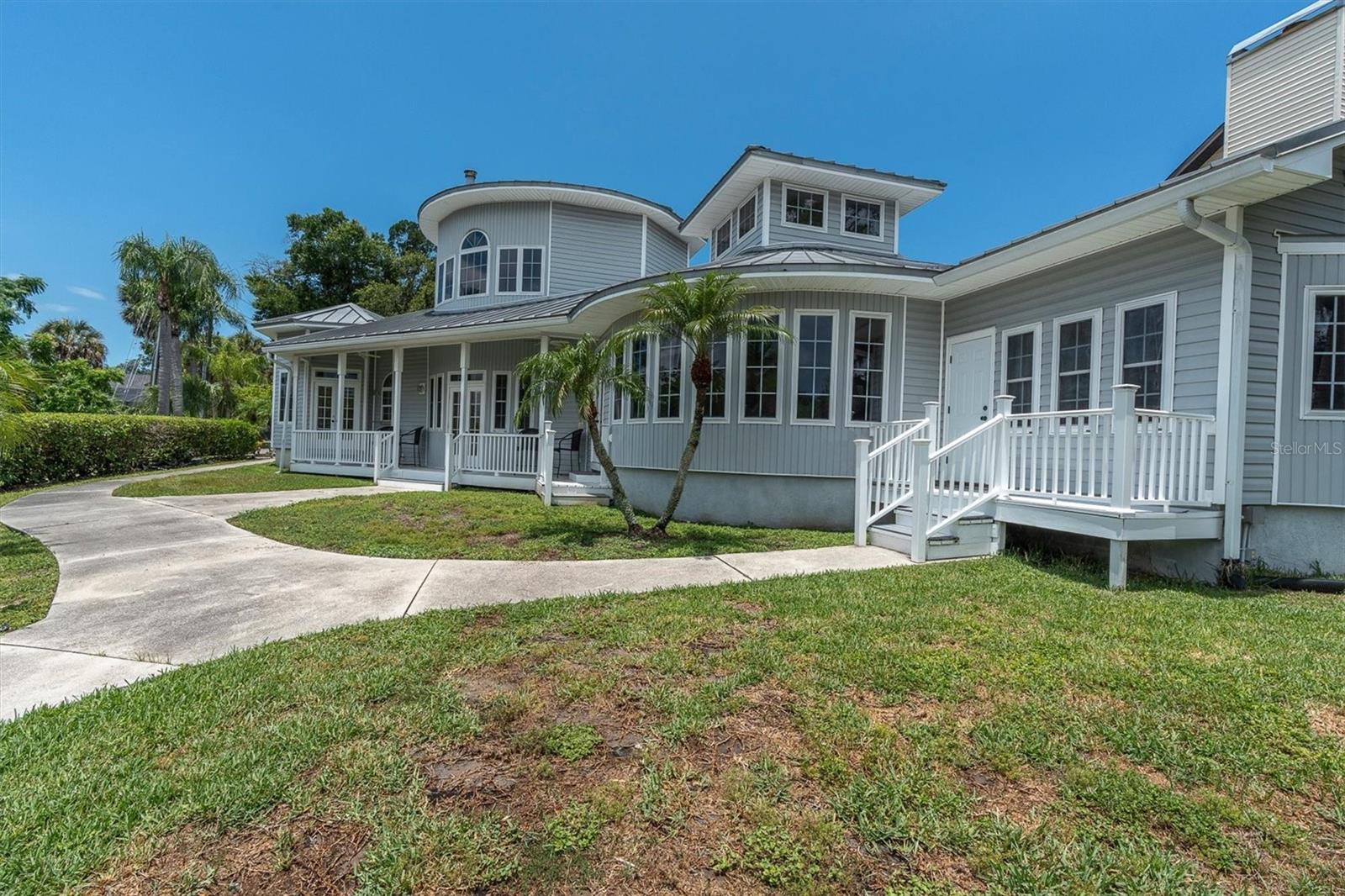 Experience Florida waterfront living at its finest in this charming single-story home nestled along the scenic Cotee River in the historic City of New Port Richey. This well-maintained 3-bedroom, 2-bath residence offers comfortable one-level living and an attached 2-car garage, built with ICF concrete walls and Standing seam metal roof, combining convenience with an exceptional waterfront lifestyle. Although residing in a flood zone, the home was not flooded from storm surge of Hurricane Helene and Hurricane Milton. 
Step outside to your private waterfront retreat featuring a boat dock equipped with a boat lift, water, and electric service, plus a covered boat slip—perfect for boating enthusiasts and easy access to the Gulf only passing under one bridge. Whether you're enjoying peaceful river views, entertaining guests, or setting out for a day on the water, this property offers the ideal setting.
Located in the historic downtown New Port Richey, golfcart friendly, you'll enjoy proximity to local shops, dining, parks, and community events while embracing the relaxed charm of waterfront living 
Back in the day this area was known as the mini-Hollywood enjoyed by ShirleyTemple, Gloria Swanson, Charlie Chaplin, Johnny Cash just to name a few.  Don't miss this rare opportunity to own a slice of paradise on the Cotee River. 
This is a must see waterfront property…
