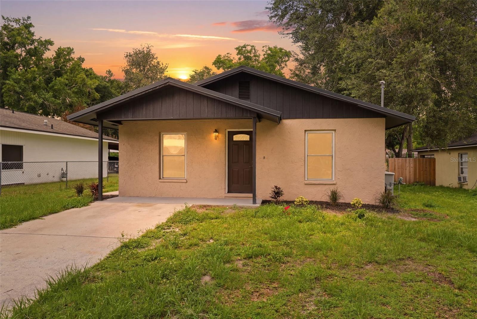 Welcome home to this beautifully updated 2-bedroom, 1-bath residence offering modern style, thoughtful upgrades, and the freedom of NO HOA restrictions. Nestled in a quiet, family-friendly neighborhood, this move-in ready home combines comfort, convenience, and peace of mind.

Inside, you'll find a bright and inviting interior featuring new flooring, fresh paint, updated lighting, and modern fixtures throughout. The renovated kitchen showcases contemporary finishes and ample cabinet space, while the updated bathroom has been tastefully redesigned with today's buyer in mind.

The functional floor plan offers spacious bedrooms, a comfortable living area, a dedicated dining space, and an interior laundry room. Major improvements have already been completed, including exterior paint and a durable metal roof, providing long-term value and low-maintenance living. A city gas generator adds an extra layer of convenience and preparedness.

Connected to city water and city sewer, this property offers worry-free utility service without the added expense or restrictions of an HOA. Ideally located just two blocks from Wilson Elementary School and less than one mile from the I-4/Alexander Street interchange, the home provides an easy commute to both Tampa and Lakeland. Enjoy being only 15 minutes from downtown Lakeland, less than 30 minutes from downtown Tampa, and close to shopping, dining, parks, and everyday conveniences.

Whether you're a first-time homebuyer, downsizing, or looking for a turnkey investment opportunity, this beautifully updated home is ready for its next owner.