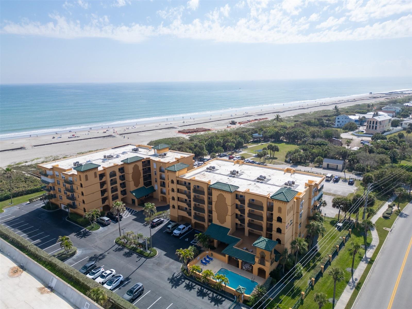 This fully-furnished 3-bed, 2-bath condo in the gated Flores Del Mar community of features an open-concept layout with abundant natural light. The home offers two balcony patios with breathtaking views of the ocean, sunrises, sunsets, and rocket launches. The updated kitchen has stainless steel appliances and a spacious breakfast bar. The primary features a spa-like en suite bath with dual vanity, tiled walk-in shower, and a jetted soaking tub. Highlights include a 2024 washer, 2024 HVAC with a fully transferable 10-yr parts/labor warranty, 2019 water heater, 2021 glass-front storm door, and electric roll-up hurricane shutters on all sliders. Residents enjoy a heated pool, spa, clubhouse, fitness center, private storage, beach access, and secure under-building parking. Whether a full-time home or investment, this retreat offers a 3-month rental minimum. Minutes from Ron Jon Surf Shop, the Cocoa Beach Pier, and Port Canaveral's cruises, shopping, and dining! Your coastal escape awaits! Schedule your showing today!
