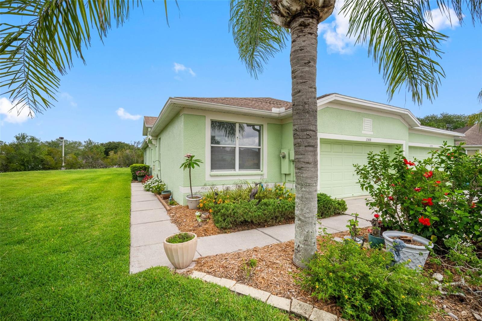 Welcome to 11588 Captiva Kay Drive, a beautifully maintained villa located in Rivercrest HOA community. Offering 1,521 square feet of comfortable living space, this 3-bedroom, 2-bathroom home features an open and functional floor plan designed for easy Florida living.
The spacious living and dining areas provide the perfect setting for entertaining guests or enjoying quiet evenings at home. The well-appointed kitchen offers ample cabinetry, generous counter space, and a convenient layout that flows seamlessly into the main living areas. The primary suite serves as a private retreat with an en-suite bath and abundant closet space, while two additional bedrooms provide flexibility for family, guests, or a home office.
A two-car garage offers plenty of storage and convenience, and the low-maintenance villa lifestyle allows you more time to enjoy everything the community has to offer.
Located in the HOA Rivercrest community, residents enjoy access to beautiful amenities including a clubhouse, resort-style swimming pool, splash park, playgrounds, lighted tennis courts, basketball courts, walking and jogging trails, and. scenic lakes. Rivercrest is conveniently located near shopping, dining, medical facilities, major highways, and everything the Tampa Bay area has to offer.
Whether you're a first-time homebuyer, downsizing, or searching for a low-maintenance Florida lifestyle, this Rivercrest villa is a fantastic opportunity to call home.